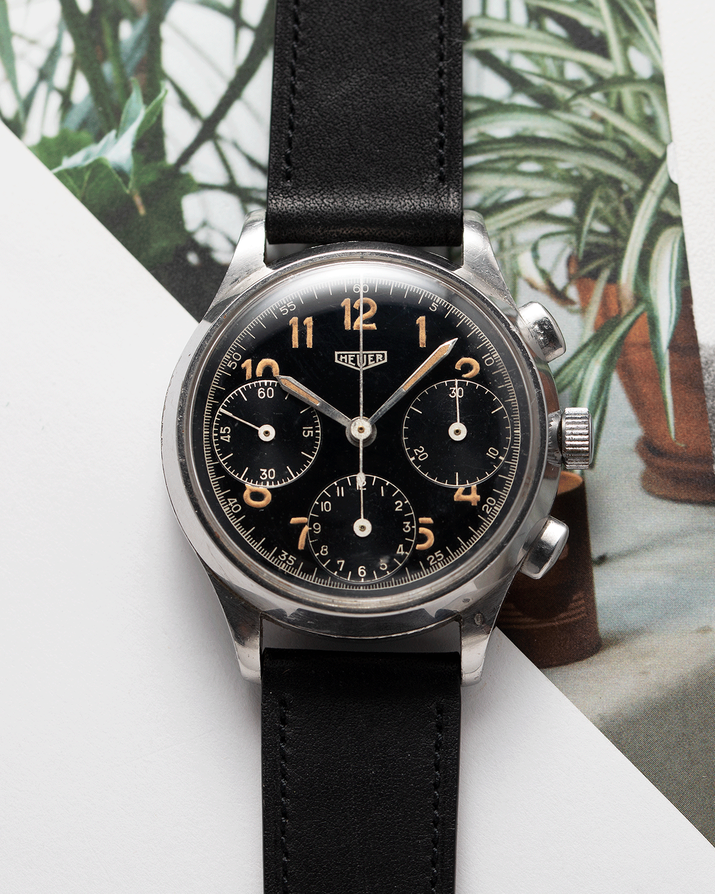Brand: Heuer Year: 1940’s Reference Number: 345 Material: Stainless Steel Movement: Valjoux 71 Case Diameter: 36mm Lug Width: 18mm Bracelet/Strap: Nostime Black Calf