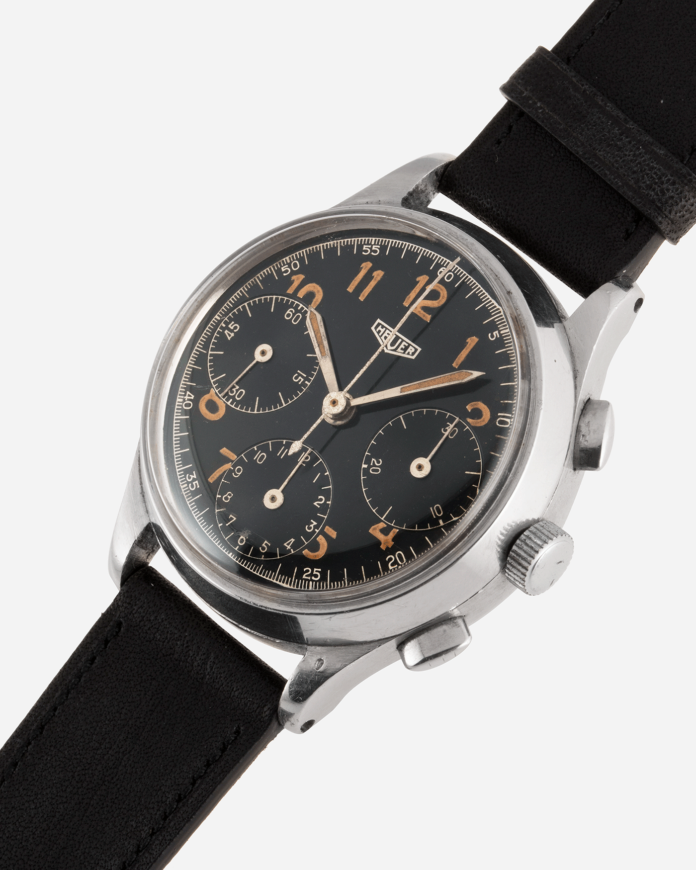 Brand: Heuer Year: 1940’s Reference Number: 345 Material: Stainless Steel Movement: Valjoux 71 Case Diameter: 36mm Lug Width: 18mm Bracelet/Strap: Nostime Black Calf