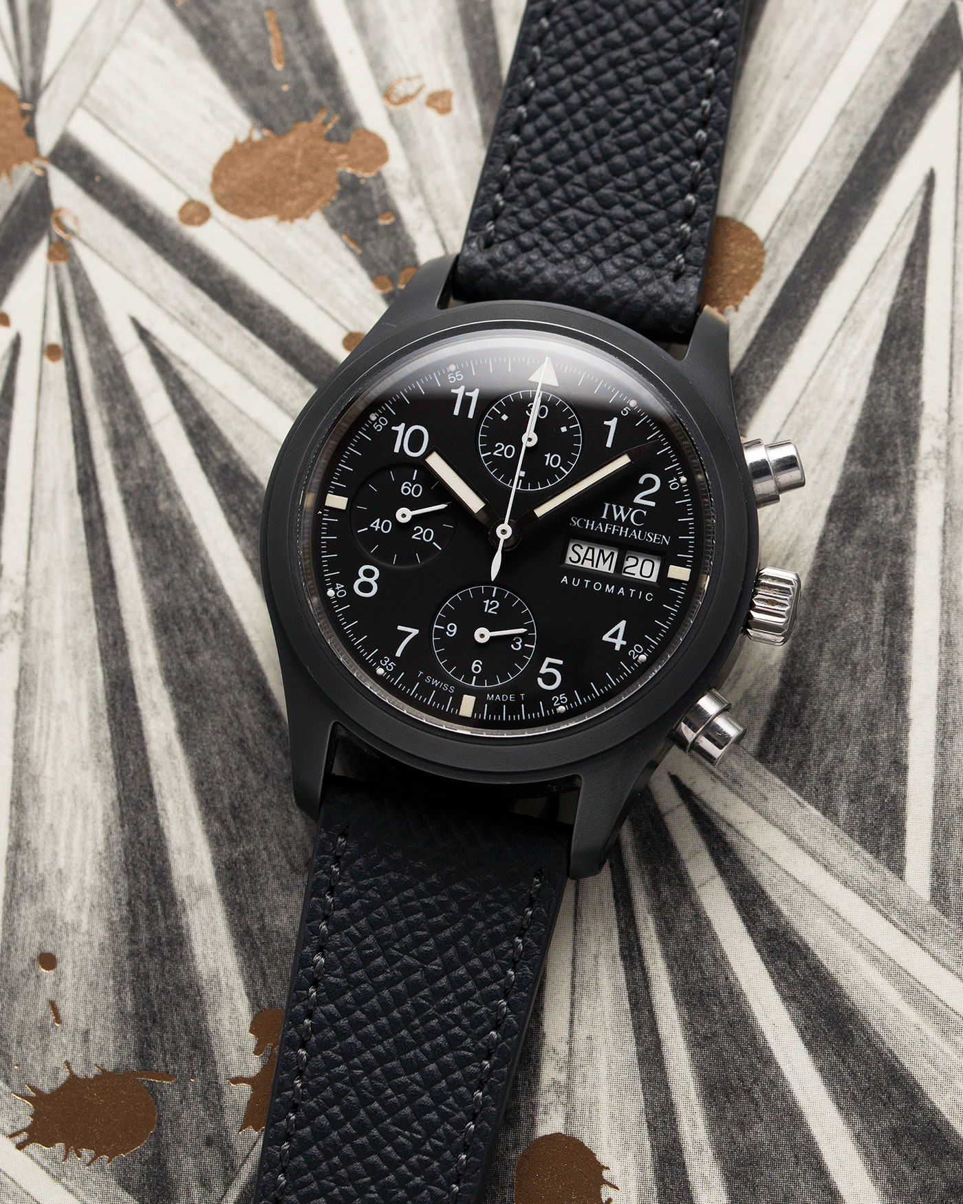 Brand: IWC Year: 1990s Model: Ceramic Fliegerchronograph Reference Number: 3705 Material: Ceramic and Stainless Steel Movement: Valjoux cal. 7750 Case Diameter: 39mm Bracelet/Strap: Molequin Anthracite Grained Calf with Stainless Steel IWC Tang Buckle