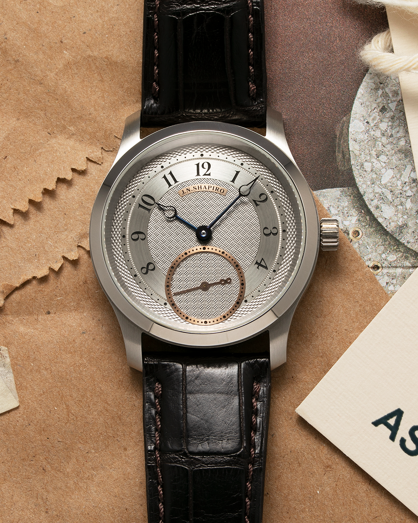 Brand: J.N. Shapiro Year: 2022 Model: Infinity Steel Material: Stainless Steel Case, 50% Palladium Dial Movement: UWD Cal. 33.1, Manual-Winding Case Diameter: 40mm Bracelet/Strap: J.N. Shapiro Dark Brown Alligator Strap