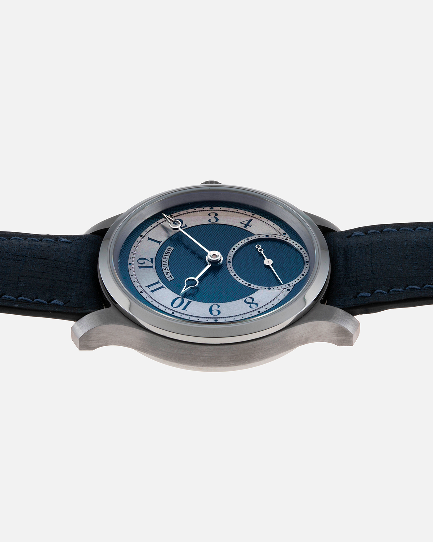 Brand: J.N. Shapiro Year: 2021 Model: Infinity Tantalum  Material: Tantalum Movement: UWD Cal. 33.1, Manual-Winding Case Diameter: 39mm Bracelet/Strap: J.N. Shapiro by Delugs Navy Blue Leather Strap with Signed Tantalum Tang Buckle with additional J.N. Shapiro Blue Alligator Strap and Grey Suede Strap