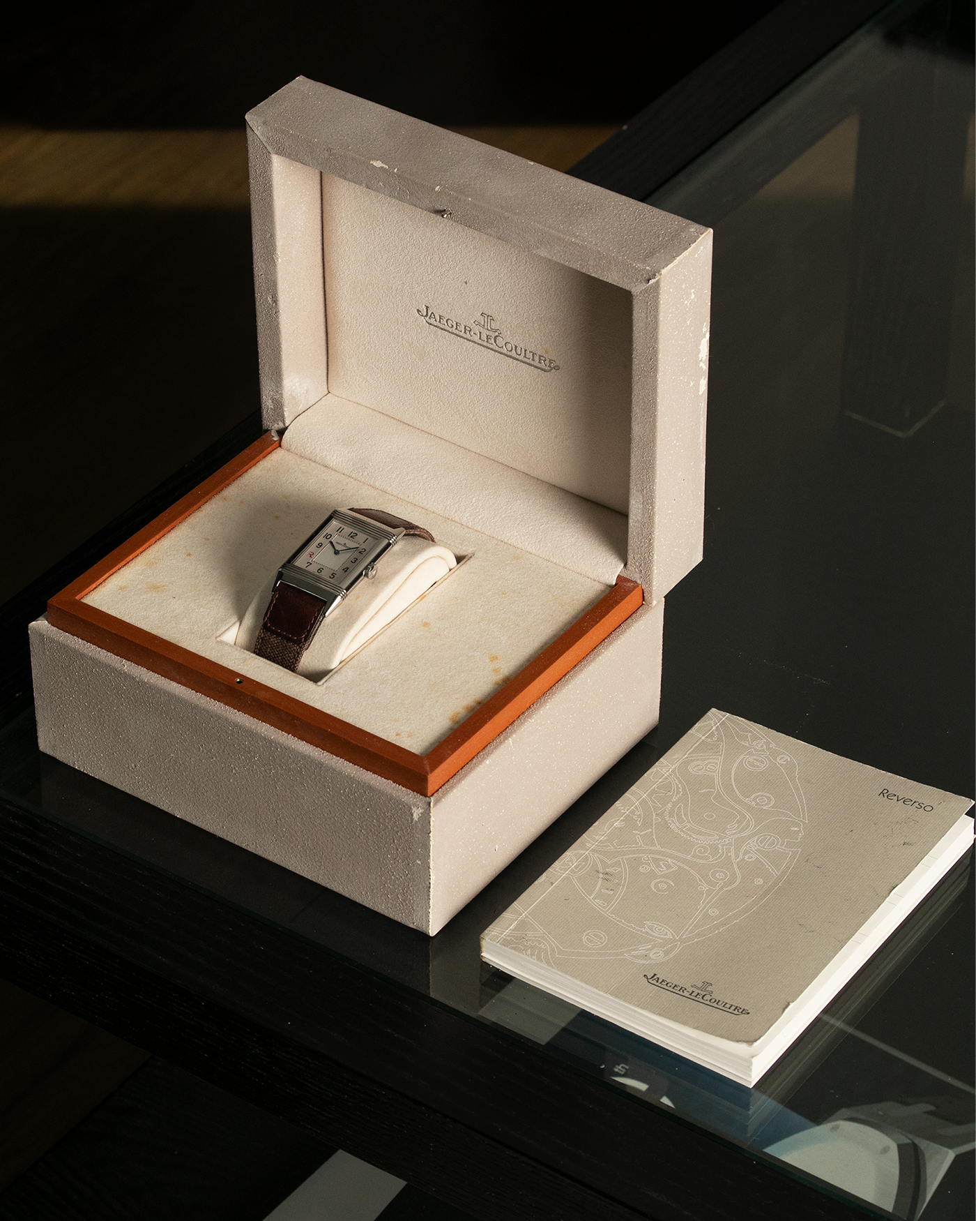 Brand: Jaeger LeCoultre Year: 2011 Model: Grande Reverso Ultra Thin Edizione Speciale Italica Ref 277.8.62 Material: Stainless Steel Movement: JLC Cal. 822, Manual-Wind Case Diameter: 46mm x 27mm Bracelet/Strap: Jaeger LeCoultre Case Fagliomo Brown Canvas Strap with Signed Tang Buckle