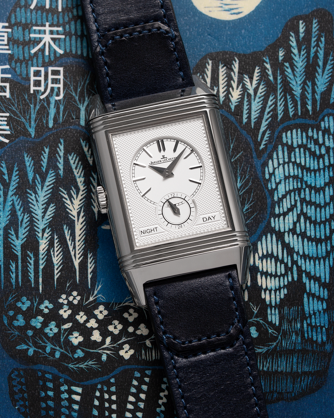 Brand: Jaeger-LeCoultre Year: 2021 Model: Reverso Tribute Duoface Material: Stainless Steel Movement: Manually-Wound JLC cal. 854A/2 Case Diameter:  47 X 28.3mm Bracelet/Strap: Blue Casa Fagliano Calf Leather Strap
