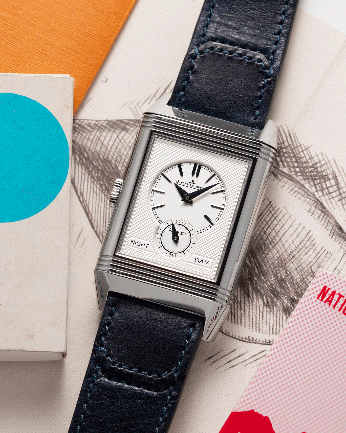 Brand: Jaeger-LeCoultre Year: 2021 Model: Reverso Tribute Duoface Material: Stainless Steel Movement: Manually-Wound JLC cal. 854A/2 Case Diameter:  47 X 28.3mm Bracelet/Strap: Blue Casa Fagliano Calf Leather Strap