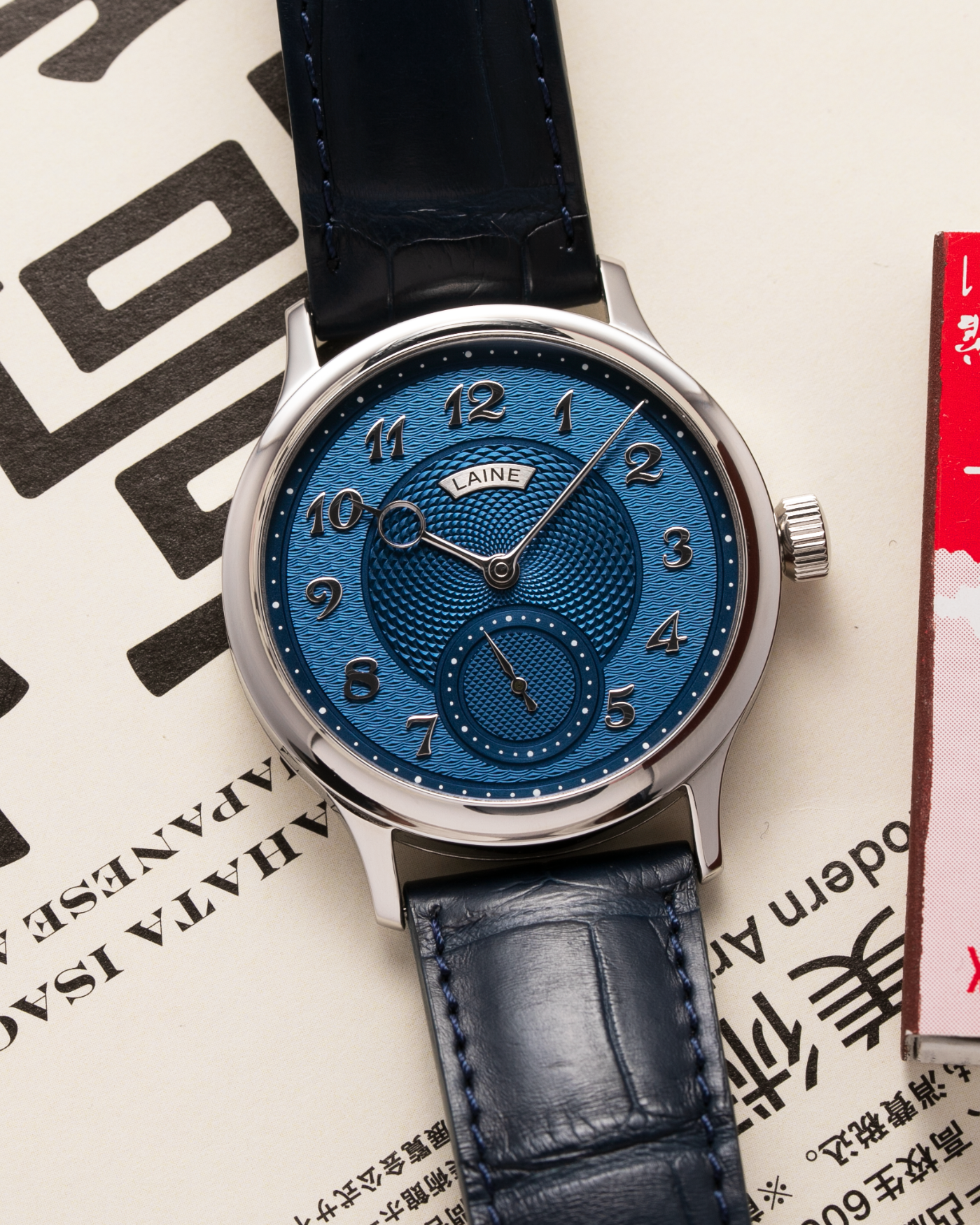 Brand: Laine Year: 2021 Model: V38 Material: Stainless Steel Movement: Vaucher VMF 5401  Case Diameter: 38mm Strap: Dark Blue Laine Alligator Strap and Signed Stainless Steel Tang Buckle