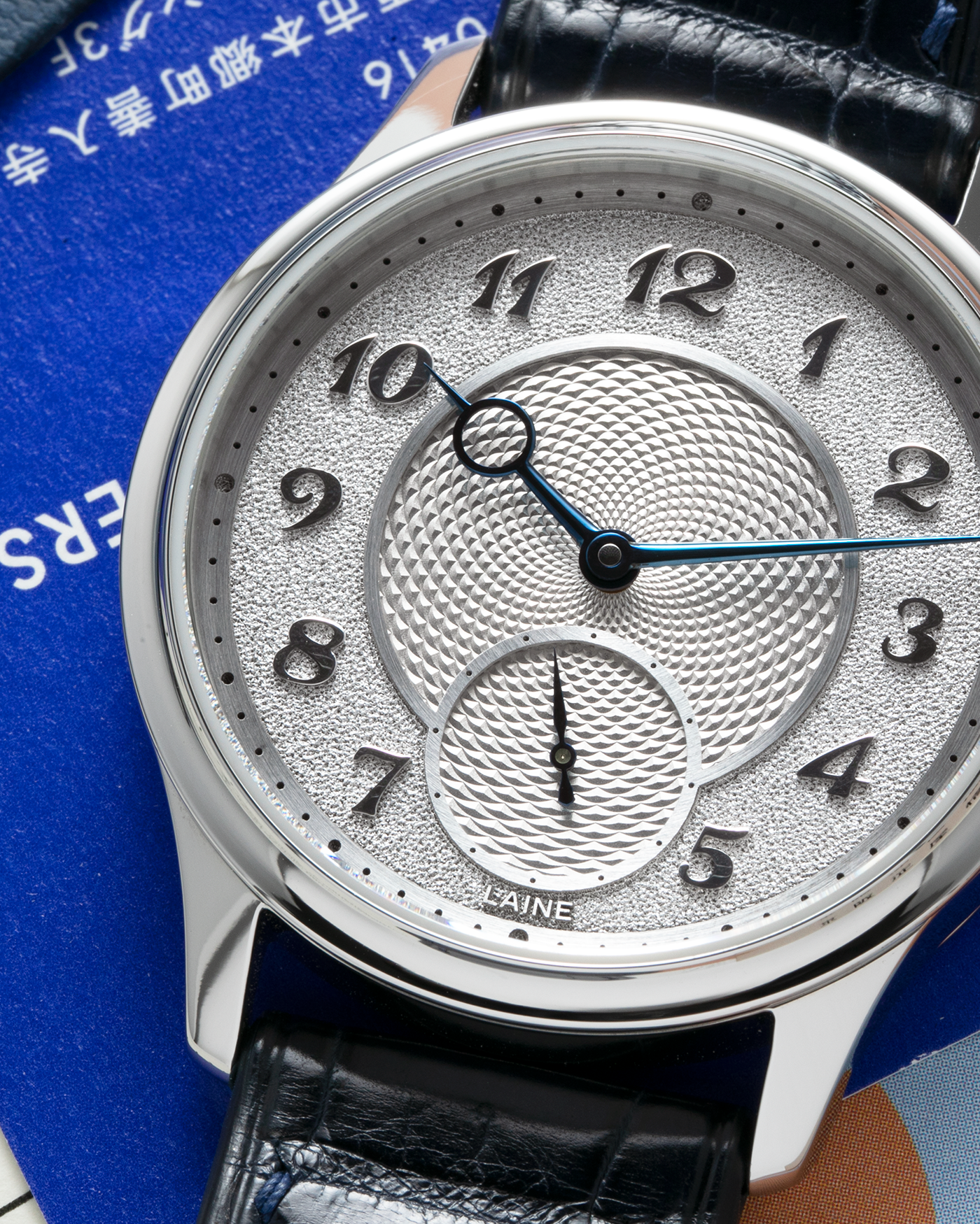 Brand: Laine Year: 2022 Model: V38 Material: Stainless Steel Movement: Vaucher VMF 5401  Case Diameter: 38mm Strap: Dark Blue Laine Alligator Strap and Signed Stainless Steel Tang Buckle