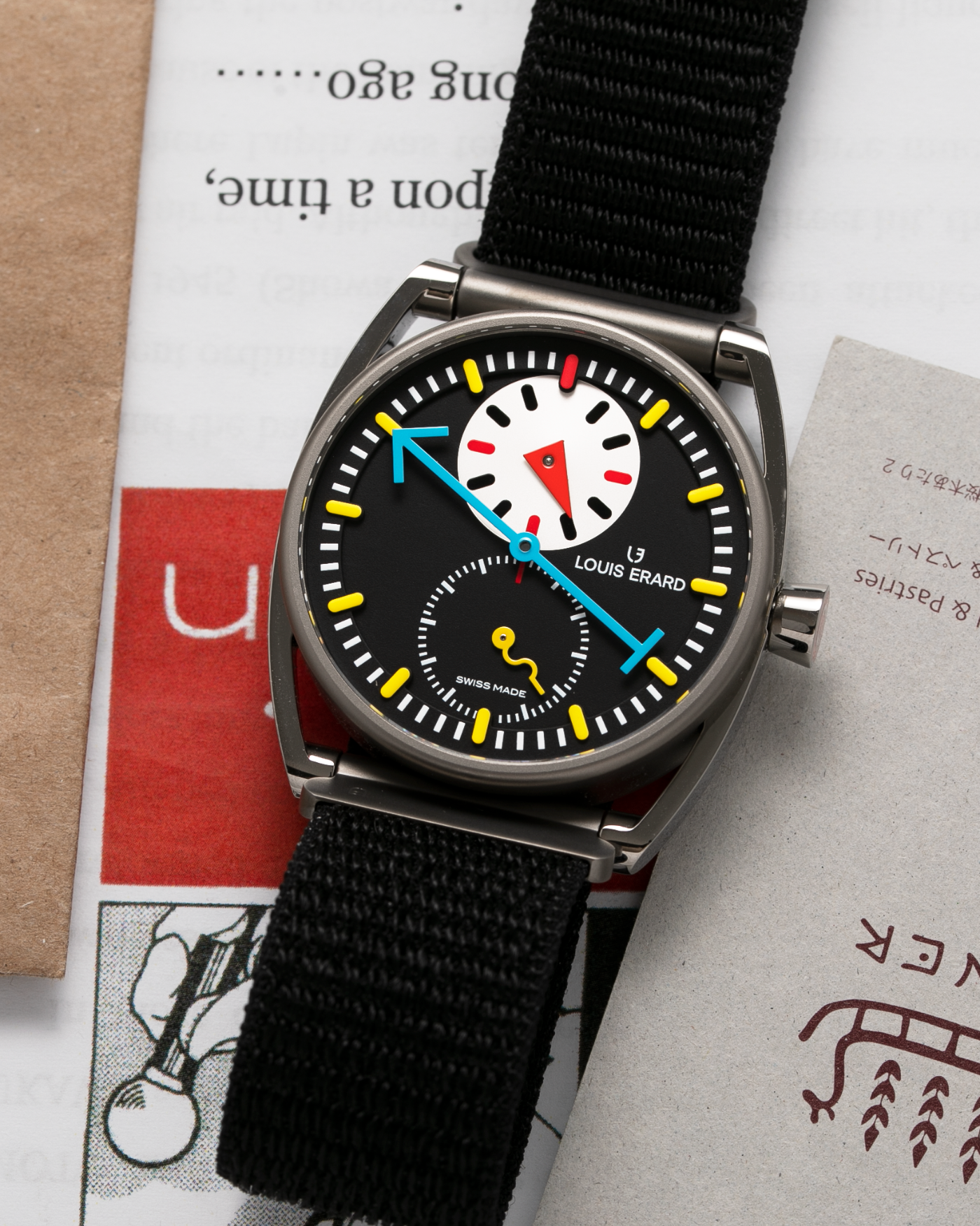 Brand: Louis Erard X Alain Silberstein Year: 2021 Model: Le Regulateur Material: Microblasted grade 2 titanium & polished grade 5 titanium Movement: Sellita SW266-1 Case Diameter: 40mm Bracelet/Strap: Louis Erard X Alain Silberstein Fabric Strap
