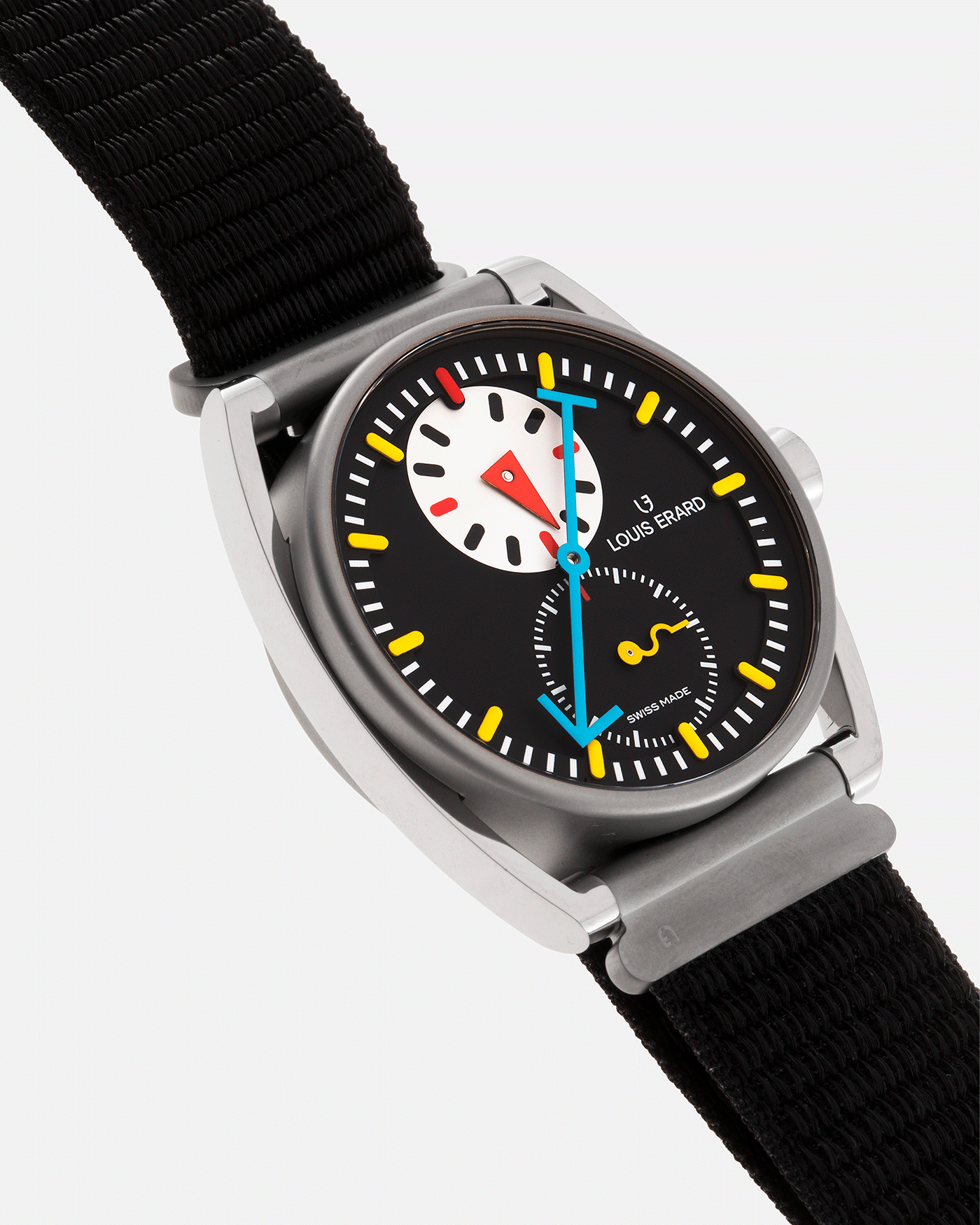 Brand: Louis Erard X Alain Silberstein Year: 2021 Model: Le Regulateur Material: Stainless Steel Movement: Selitta Based Self Winding Movement Case Diameter: 40mm Bracelet/Strap: Louis Erard X Alain Silberstein Fabric Strap