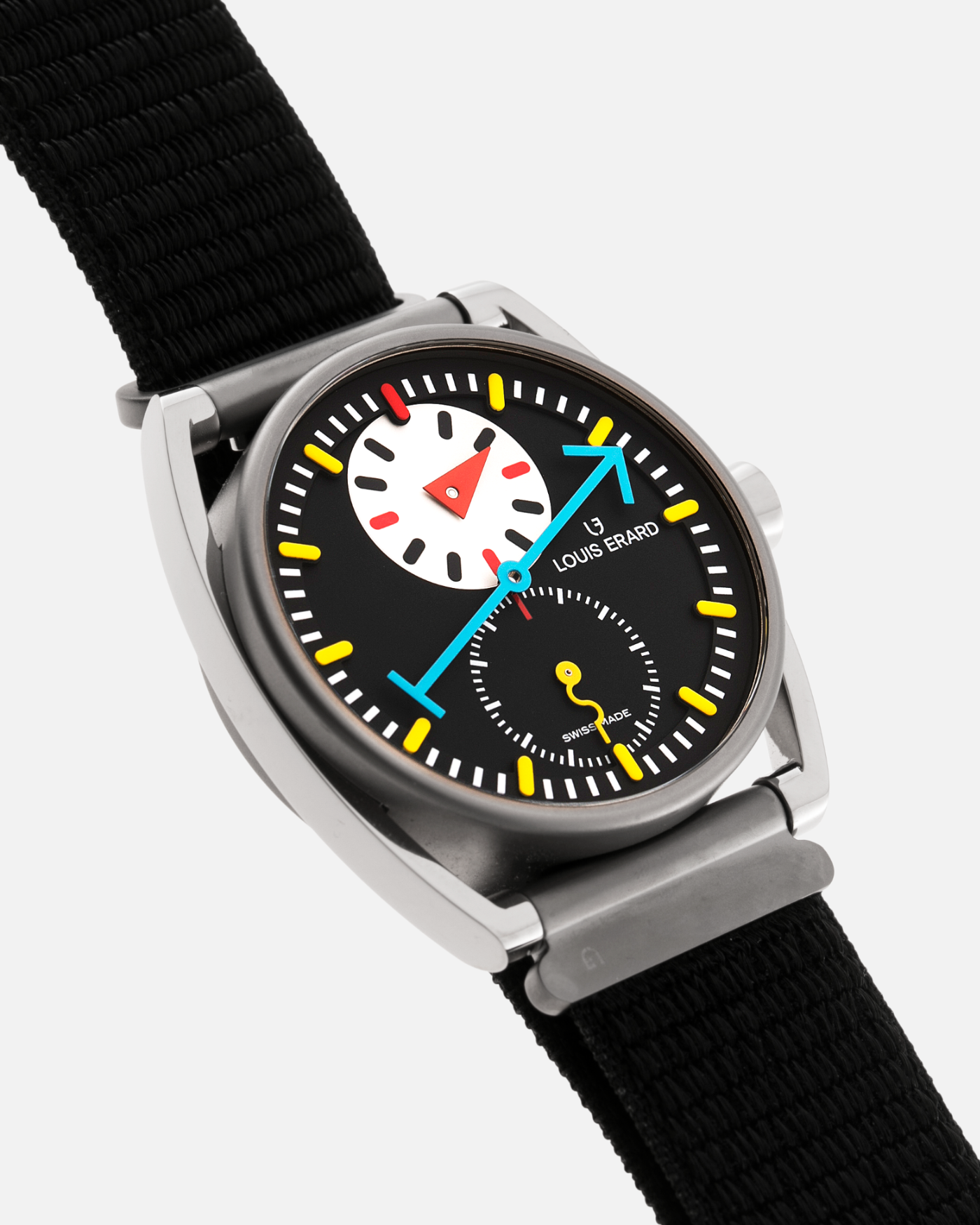Brand: Louis Erard X Alain Silberstein Year: 2021 Model: Le Regulateur Material: Microblasted grade 2 titanium & polished grade 5 titanium Movement: Sellita SW266-1 Case Diameter: 40mm Bracelet/Strap: Louis Erard X Alain Silberstein Fabric Strap
