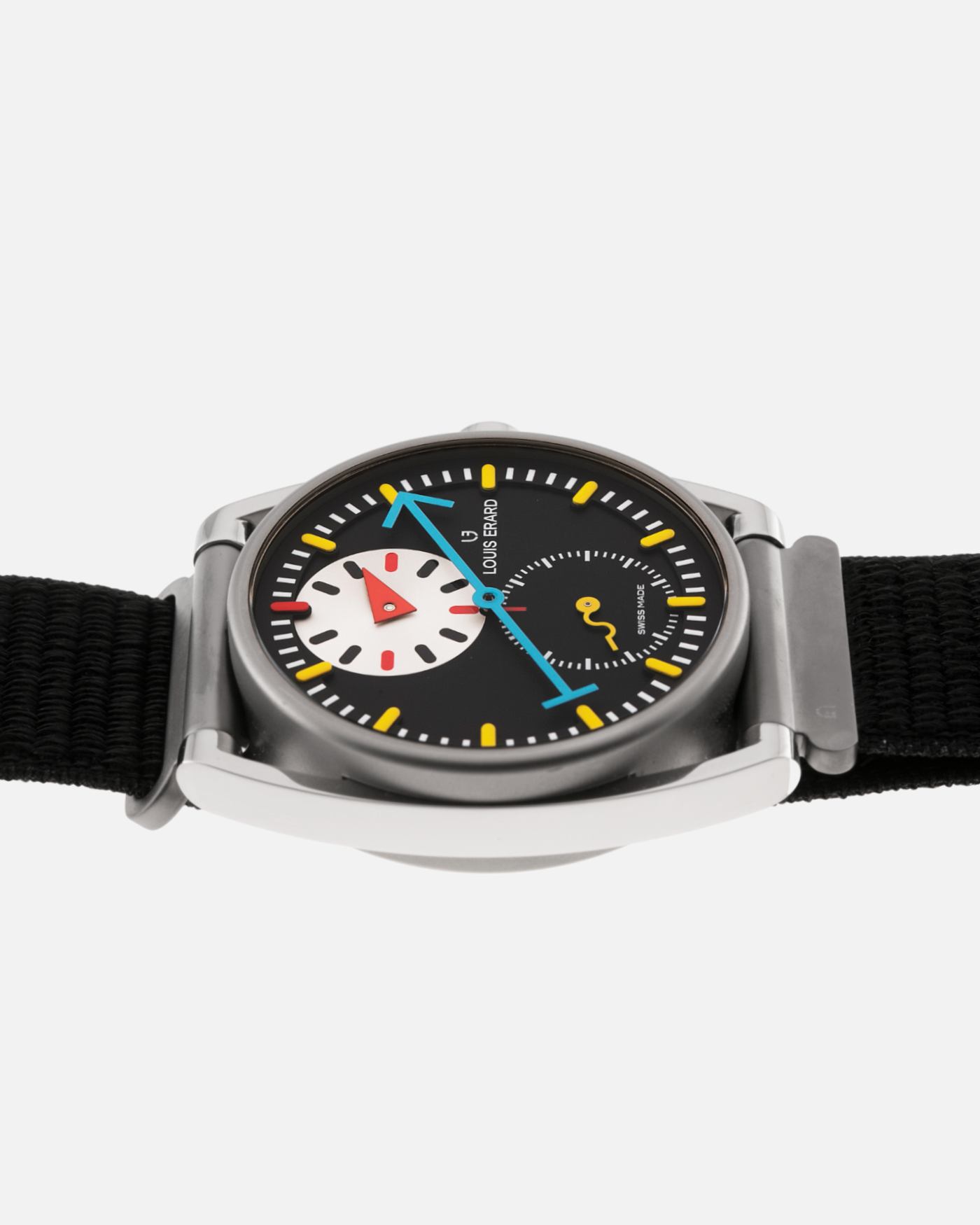 Brand: Louis Erard X Alain Silberstein Year: 2021 Model: Le Regulateur Material: Microblasted grade 2 titanium & polished grade 5 titanium Movement: Sellita SW266-1 Case Diameter: 40mm Bracelet/Strap: Louis Erard X Alain Silberstein Fabric Strap