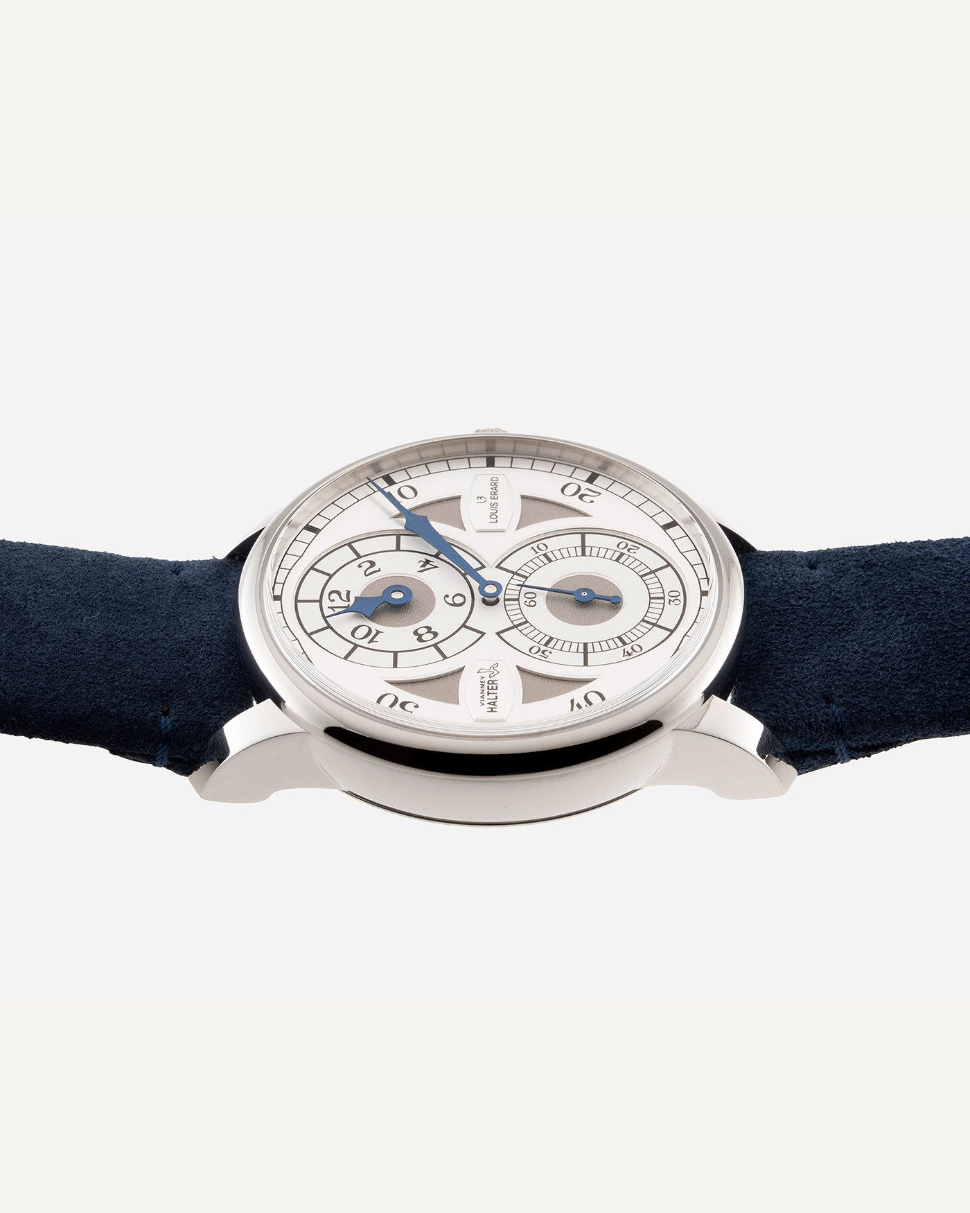 Brand: Louis Erard X Vianney Halter Year: 2020 Model: Le Regulateur Material: Stainless Steel Movement: Selitta Based Self Winding Movement Case Diameter: 42mm Bracelet/Strap: Louis Erard Blue Suede Strap with Stainless Steel Tang Buckle