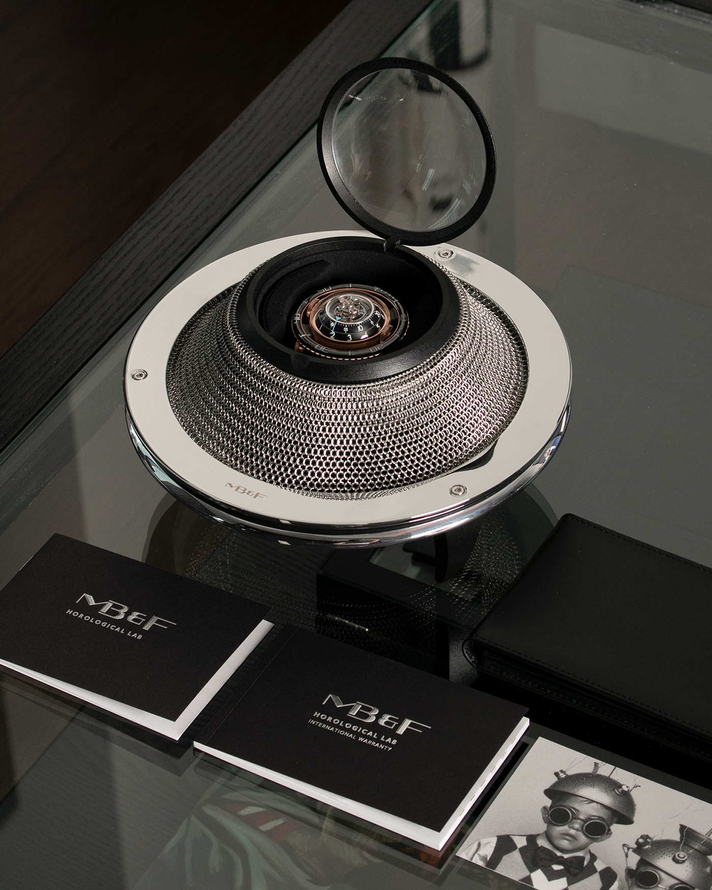 Brand: MB&F Year: 2022 Model: HM7 Aquapod Material: 18k Rose Gold Movement: In-House 3D Vertical Architecture MB&F HM7 Tourbillon Case Diameter: 53.8mm X 21.3mm With Articulating Lugs Bracelet/Strap: MB&F Black Rubber Strap with 18k Rose Gold Deployant Clasp