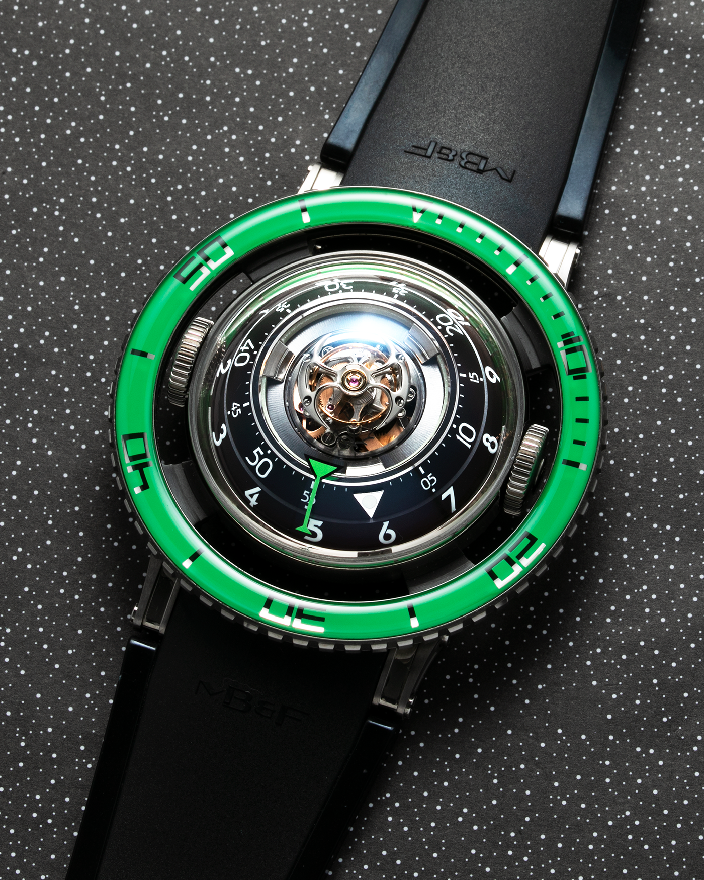 Brand: MB&F Year: 2021 Model: HM7 Aquapod Material: Grade 5 Titanium Movement: In-House 3D Vertical Architecture MB&F HM7 Tourbillon, Self-Winding Case Diameter: 53.8mm X 21.3mm With Articulating Lugs Bracelet/Strap: MB&F Black Rubber Strap with Grade 5 Titanium Deployant Clasp