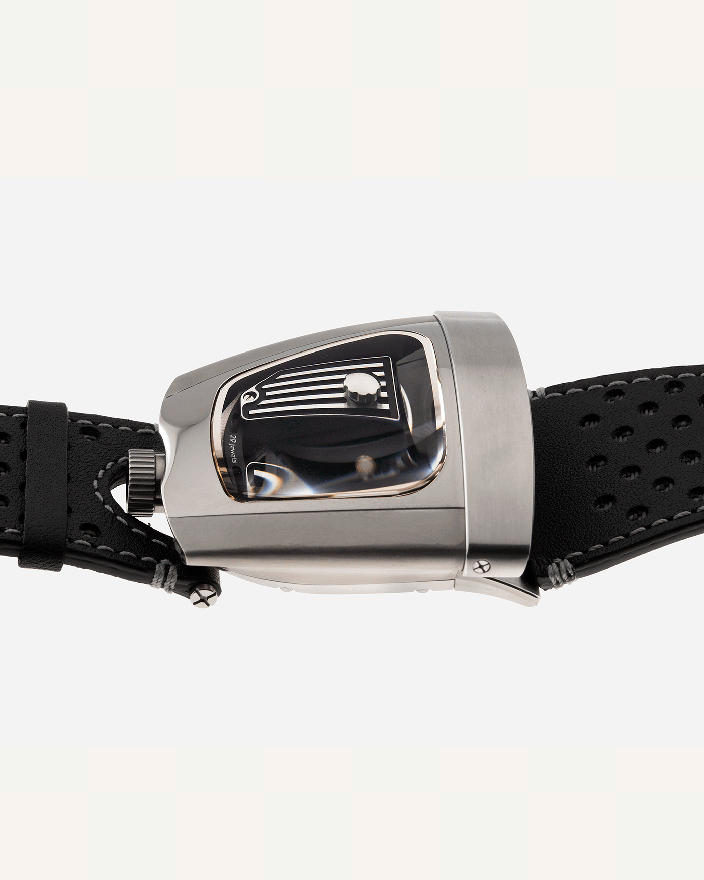 Brand: MB&F Year: 2018 Model: HMX Black Lotus 10th Anniversary Material: Stainless Steel and Titanium Movement: Selitta Based Self Winding Movement Case Diameter: 46.8 x 44.3 x 20.7 mm Bracelet/Strap: MB&F Black Leather Strap and Tang Buckle