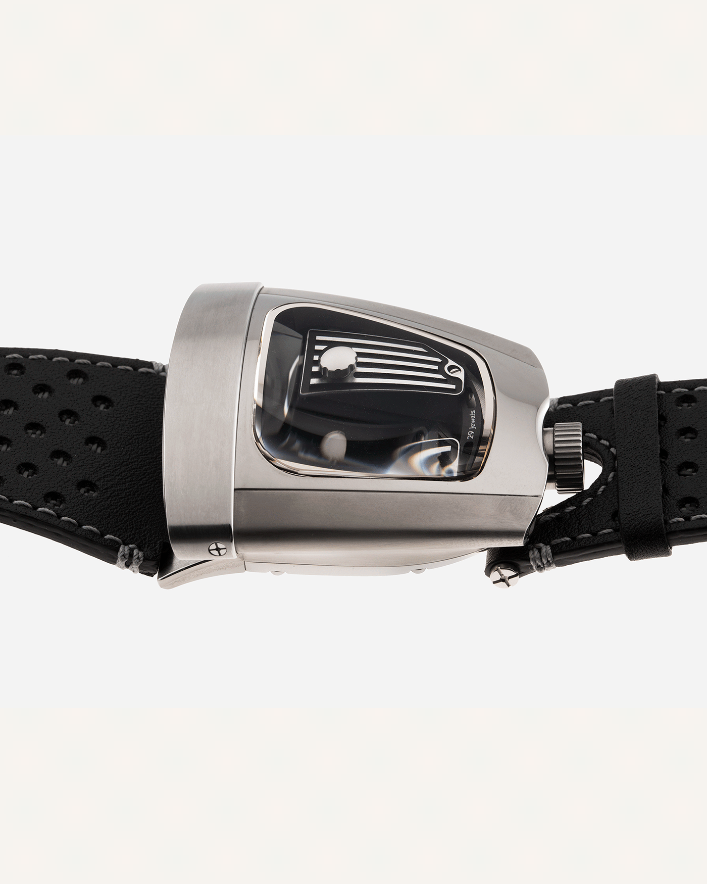 Brand: MB&F Year: 2018 Model: HMX Black Lotus 10th Anniversary Material: Stainless Steel and Titanium Movement: Selitta Based Self Winding Movement Case Diameter: 46.8 x 44.3 x 20.7 mm Bracelet/Strap: MB&F Black Leather Strap and Tang Buckle