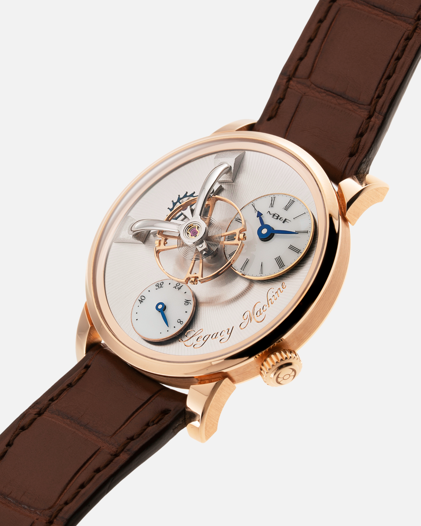Brand: MB&F Year: 2021 Model: LM101  Material: Rose Gold Movement: In-House MB&F Caliber in collaboration with Kari Voutilainen Case Diameter: 40mm Bracelet/Strap: MB&F Brown Alligator Strap and 18k Rose Gold Tang Buckle