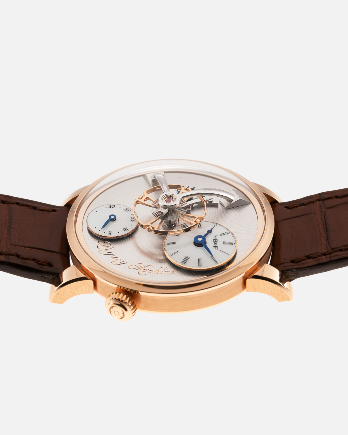 Brand: MB&F Year: 2021 Model: LM101  Material: Rose Gold Movement: In-House MB&F Caliber in collaboration with Kari Voutilainen Case Diameter: 40mm Bracelet/Strap: MB&F Brown Alligator Strap and 18k Rose Gold Tang Buckle