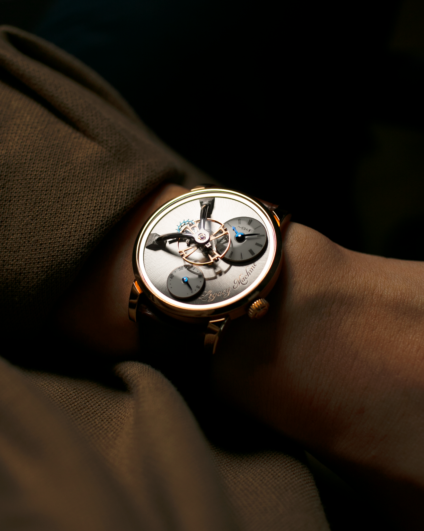 Brand: MB&F Year: 2021 Model: LM101  Material: Rose Gold Movement: In-House MB&F Caliber in collaboration with Kari Voutilainen Case Diameter: 40mm Bracelet/Strap: MB&F Brown Alligator Strap and 18k Rose Gold Tang Buckle