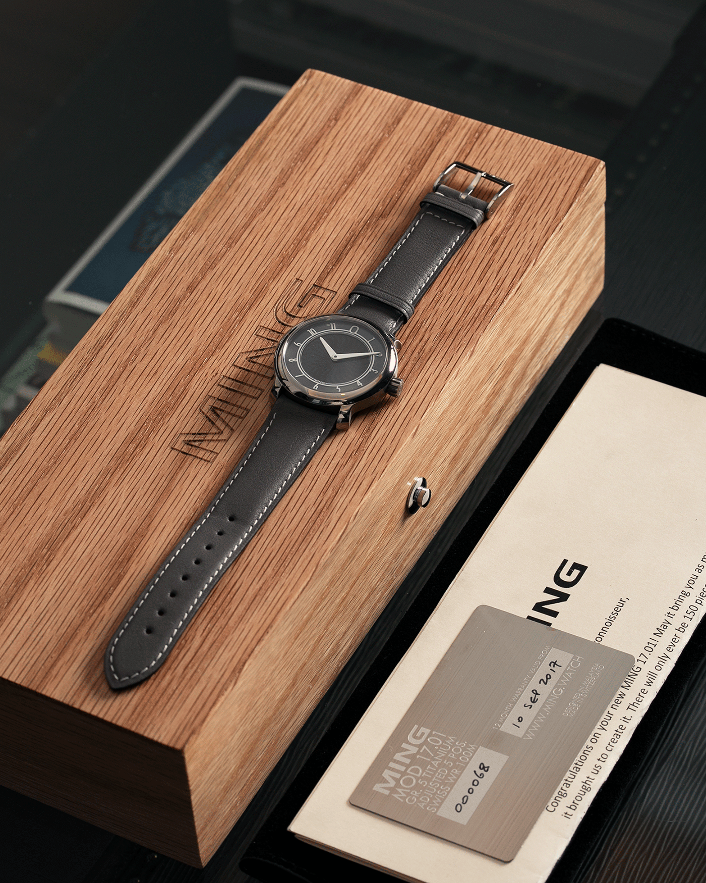 Brand: Ming Year: 2017 Model: 17.01 Material: Grade 5 Titanium Movement: Hand-winding mechanical movement Sellita SW210-1 Case Diameter: 38mm Strap: Jean Rousseau Grey Smooth Calf for MING
