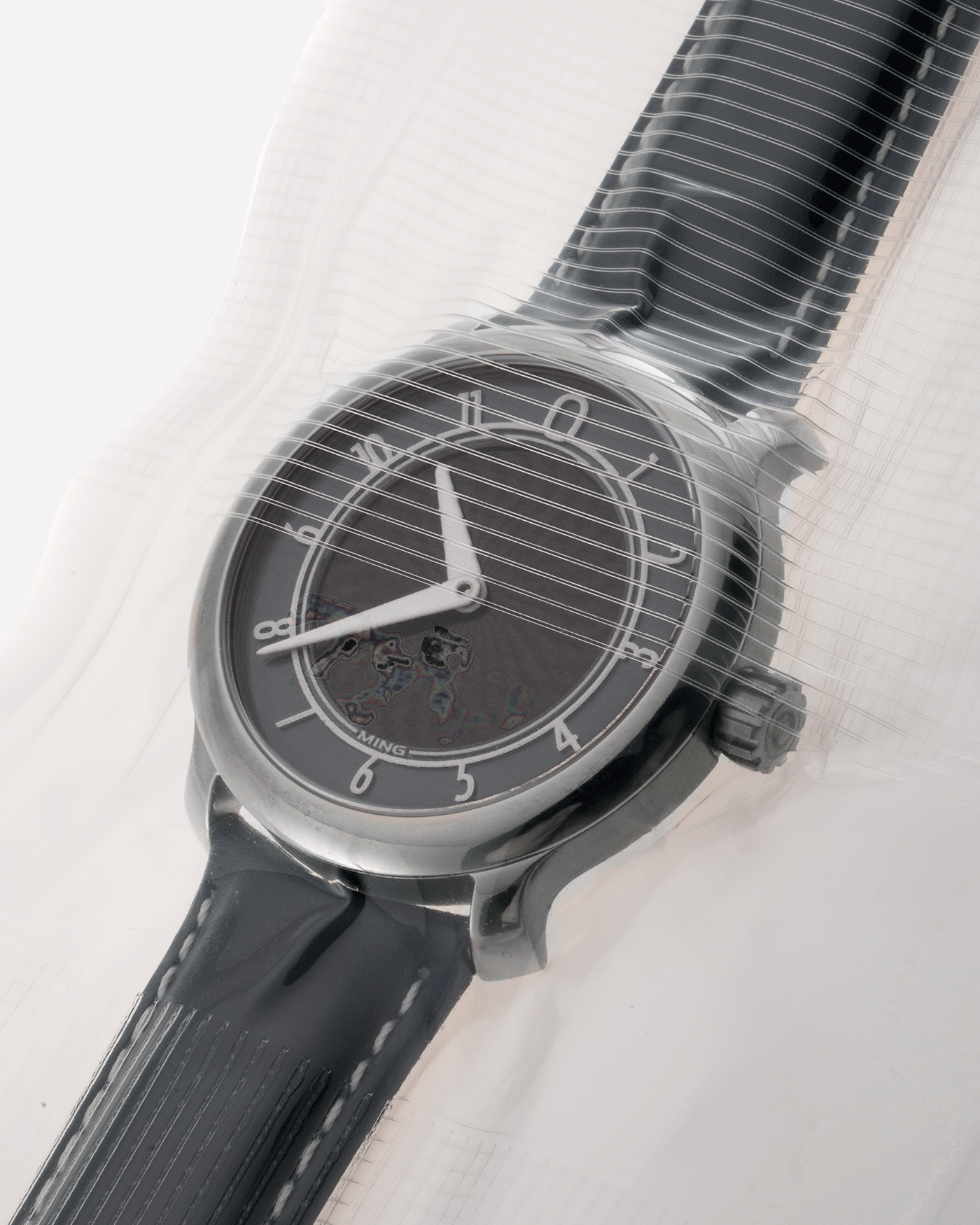 Brand: Ming Year: 2017 Model: 17.01 Material: Grade 5 Titanium Movement: Hand-winding mechanical movement Sellita SW210-1 Case Diameter: 38mm Strap: 3 Unused Ming Calf Straps, Ming Stainless Steel Tang Buckle