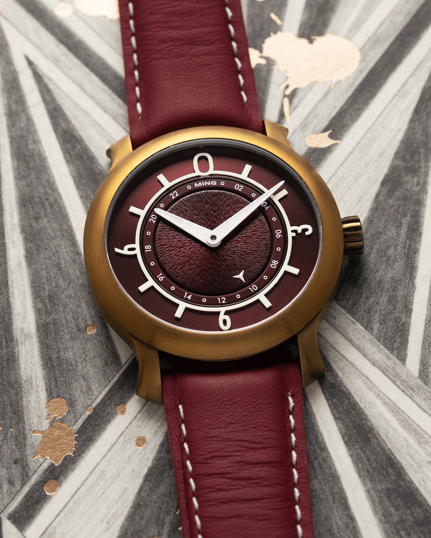 Brand: Ming Year: 2018 Model: 17.03 BB Edition Material: Anodised Grade 2 Titanium Movement: Self-Winding Sellita SW 330-1 Case Diameter: 38mm Strap: Ming Burgundy Smooth Calf by Jean Rousseau Paris and Matching Annodised Grade 2 Titanium Tang Buckle