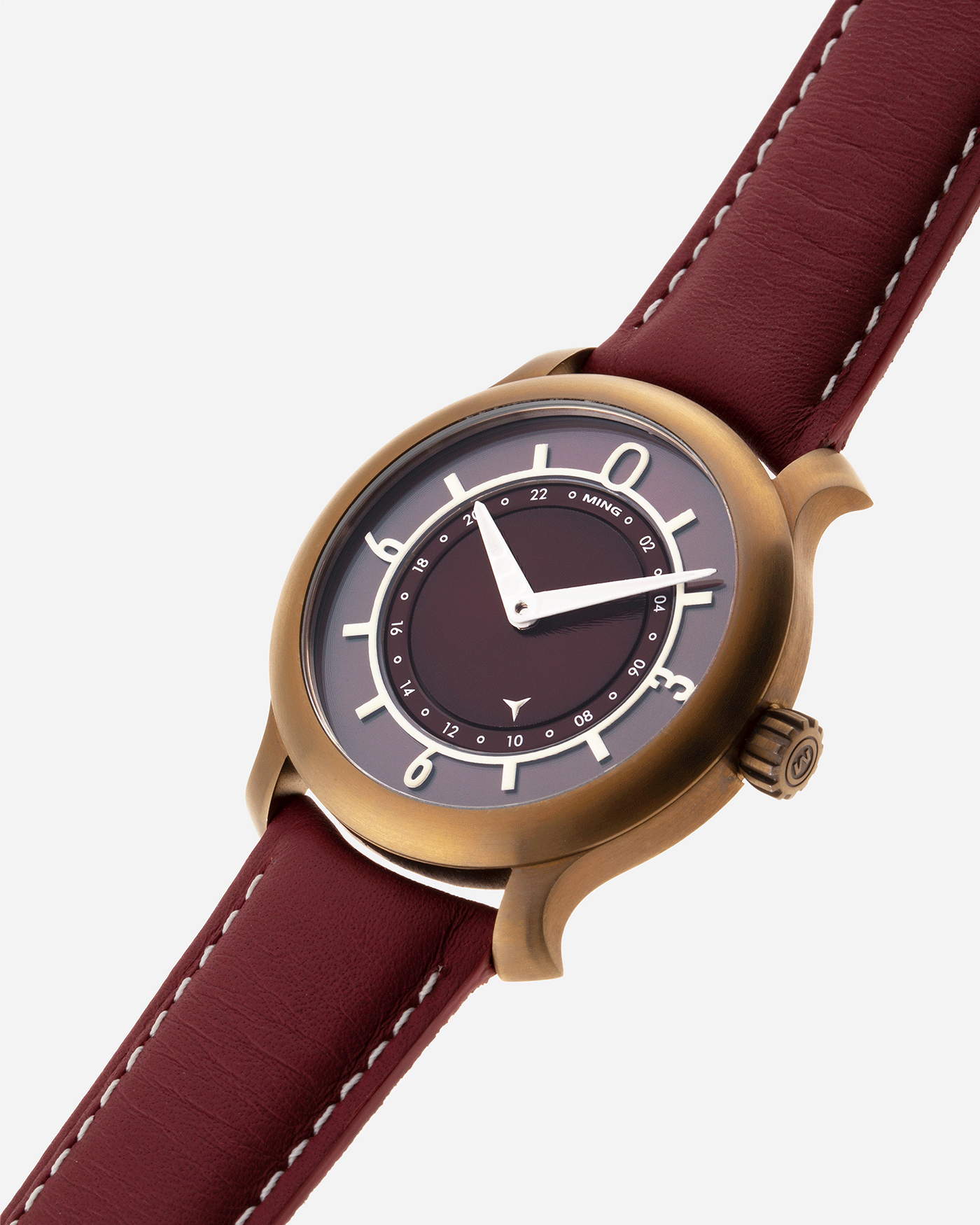 Brand: Ming Year: 2018 Model: 17.03 BB Edition Material: Anodised Grade 2 Titanium Movement: Self-Winding Sellita SW 330-1 Case Diameter: 38mm Strap: Ming Burgundy Smooth Calf by Jean Rousseau Paris and Matching Annodised Grade 2 Titanium Tang Buckle