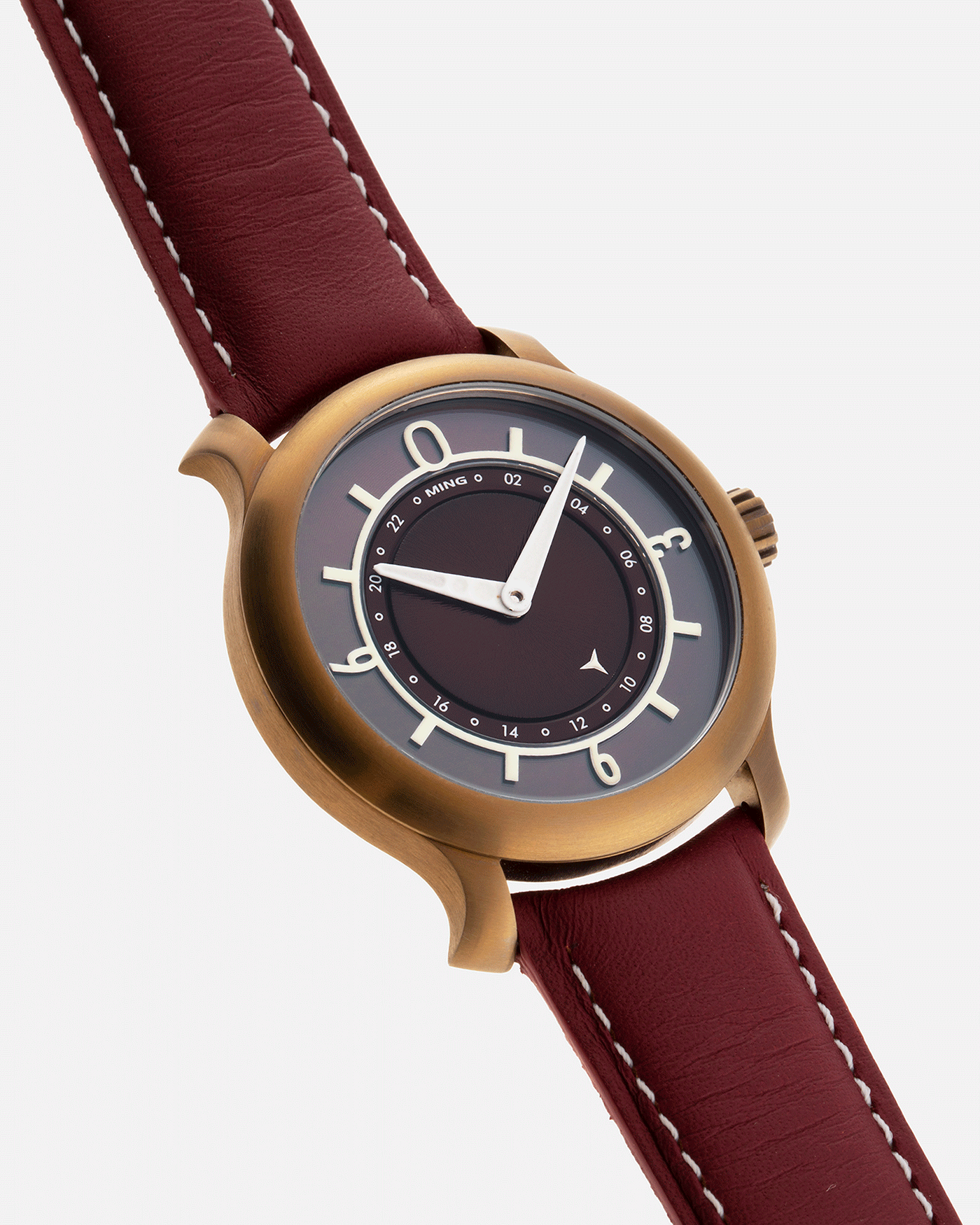Brand: Ming Year: 2018 Model: 17.03 BB Edition Material: Anodised Grade 2 Titanium Movement: Self-Winding Sellita SW 330-1 Case Diameter: 38mm Strap: Ming Burgundy Smooth Calf by Jean Rousseau Paris and Matching Annodised Grade 2 Titanium Tang Buckle