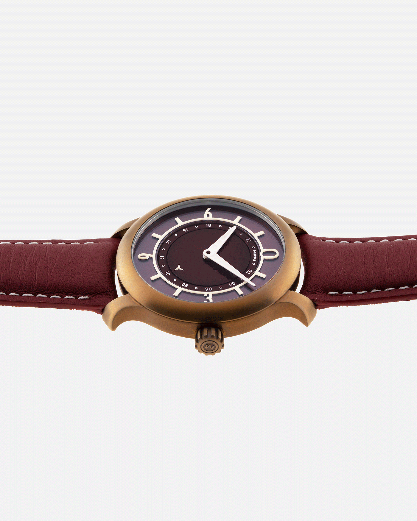 Brand: Ming Year: 2018 Model: 17.03 BB Edition Material: Anodised Grade 2 Titanium Movement: Self-Winding Sellita SW 330-1 Case Diameter: 38mm Strap: Ming Burgundy Smooth Calf by Jean Rousseau Paris and Matching Annodised Grade 2 Titanium Tang Buckle