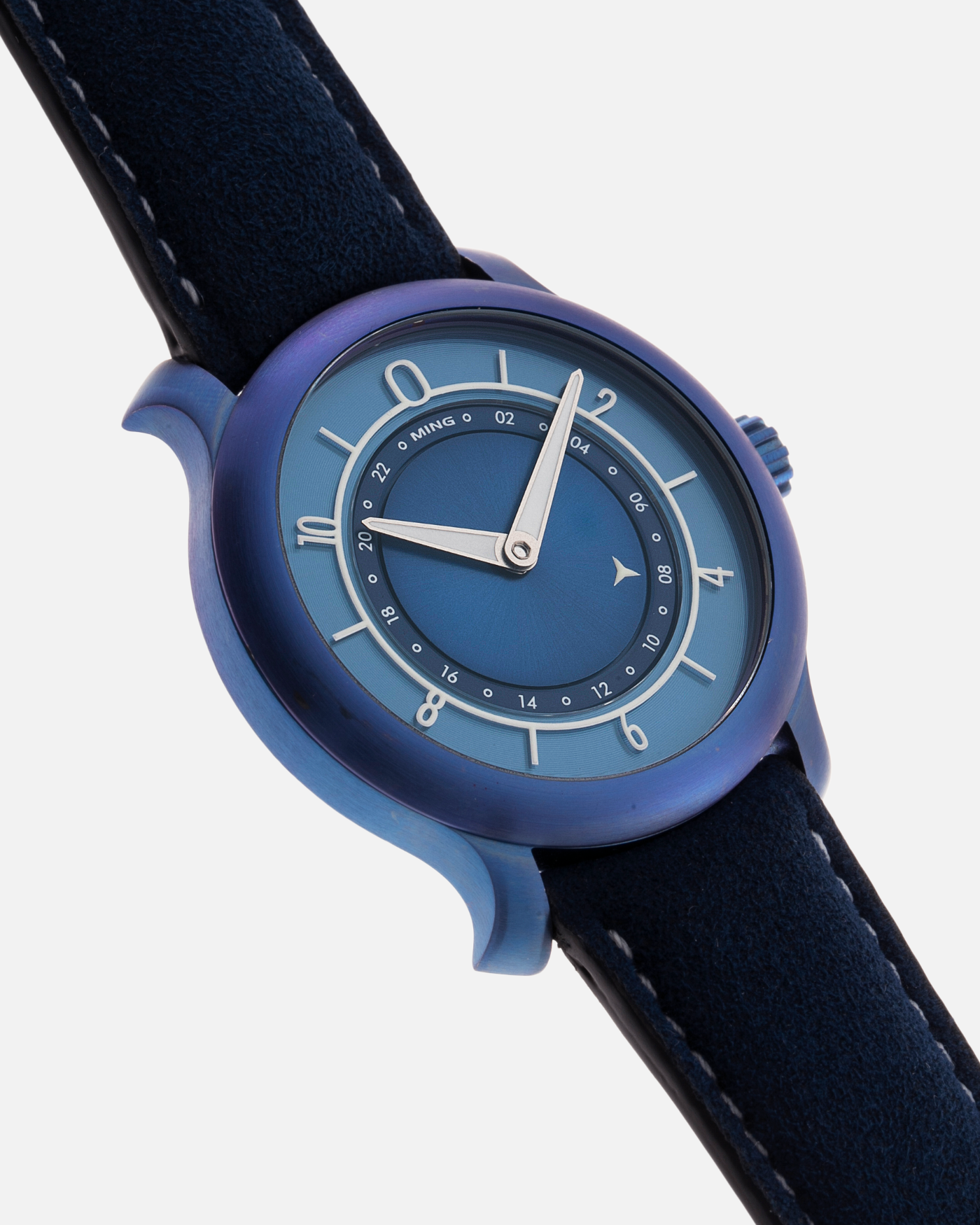 Brand: Ming Year: 2018 Model: 17.03 Material: Grade 2 Titanium Movement: Self-Winding Sellita SW 330-1 Case Diameter: 38mm Strap: Ming Blue Suede Strap and Grade 5 Ultra Blue Titanium Tang Buckle