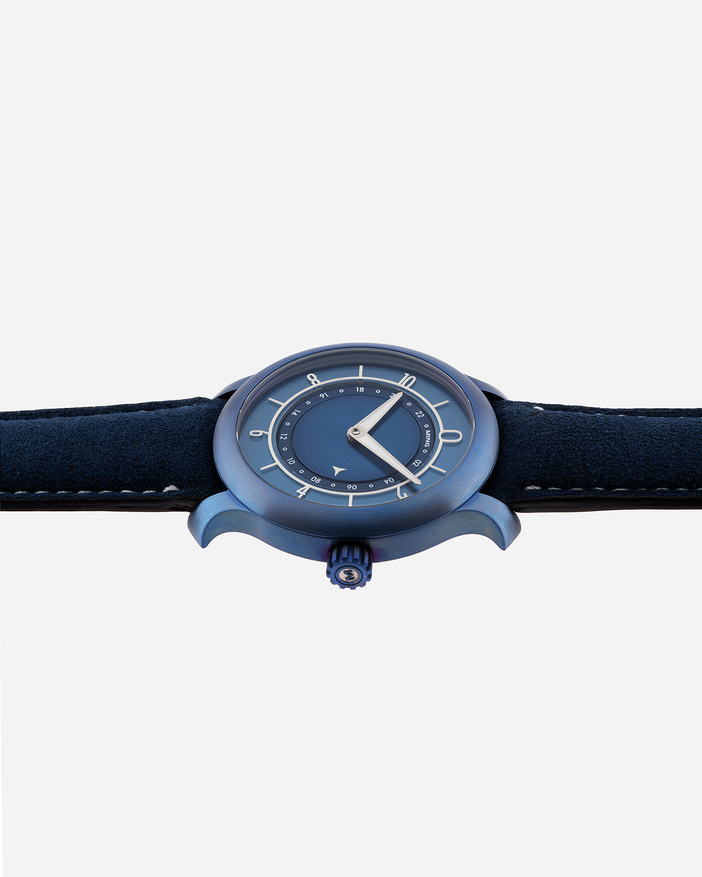 Brand: Ming Year: 2018 Model: 17.03 Material: Grade 2 Titanium Movement: Self-Winding Sellita SW 330-1 Case Diameter: 38mm Strap: Ming Blue Suede Strap and Grade 5 Ultra Blue Titanium Tang Buckle