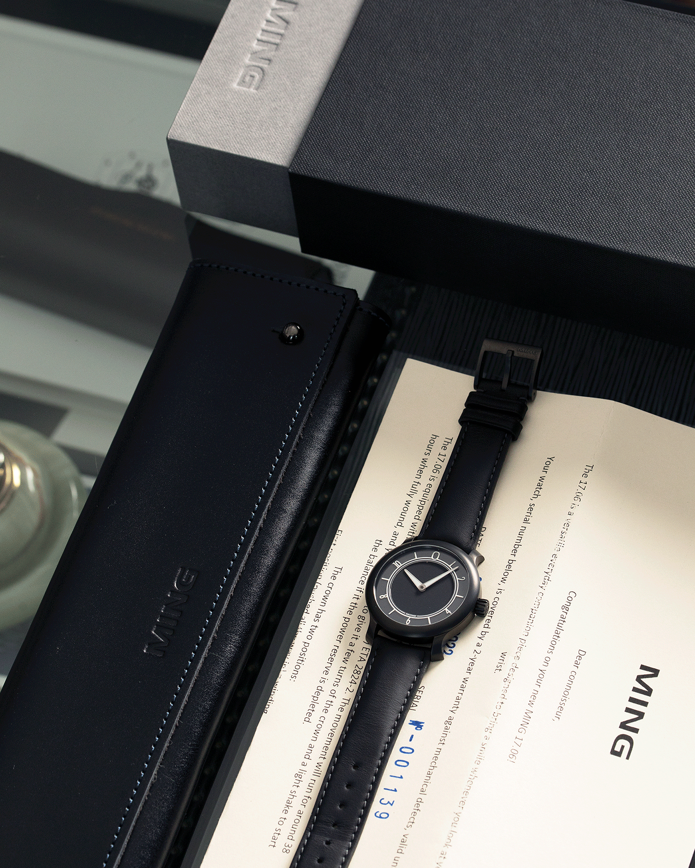 Brand: Ming Year: 2019 Model: 17.06 Monolith Material: Stainless Steel Movement: Heavily Modified ETA 2824-2 Case Diameter: 38mm Strap: Jean Rousseau Black Calf Strap for MING