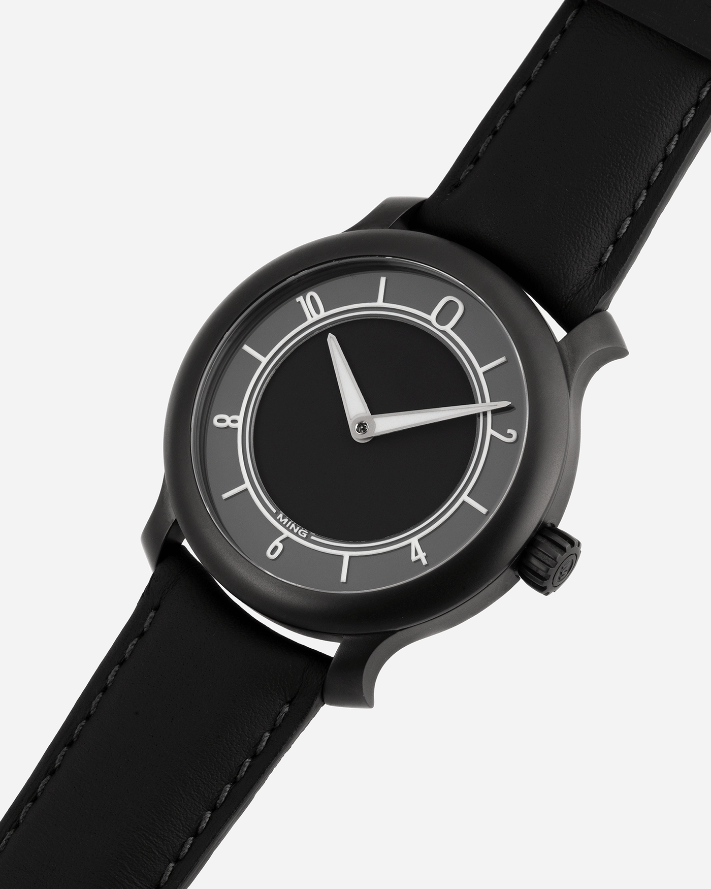 Brand: Ming Year: 2019 Model: 17.06 Monolith Material: Stainless Steel Movement: Heavily Modified ETA 2824-2 Case Diameter: 38mm Strap: Jean Rousseau Black Calf Strap for MING
