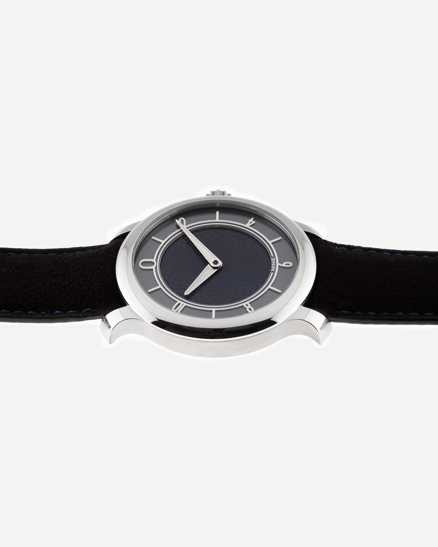 Brand: Ming Year: 2019 Model: 17.06 Material: Stainless Steel Movement: Heavily Modified ETA 2824-2 Case Diameter: 38mm Strap: Jean Rousseau Black Suede with Blue Stitching for MING