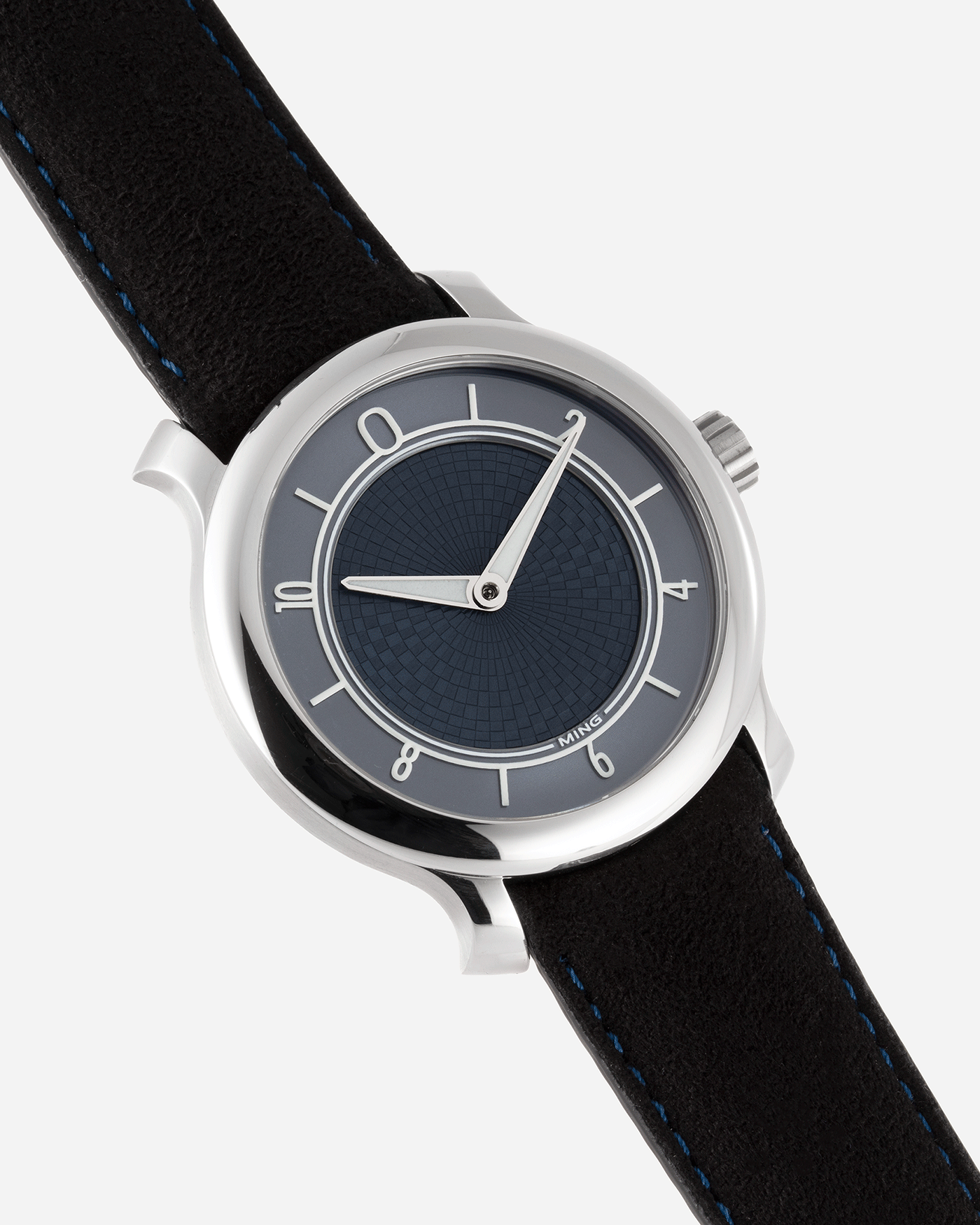 Brand: Ming Year: 2019 Model: 17.06 Material: Stainless Steel Movement: Heavily Modified ETA 2824-2 Case Diameter: 38mm Strap: Jean Rousseau Black Suede with Blue Stitching for MING