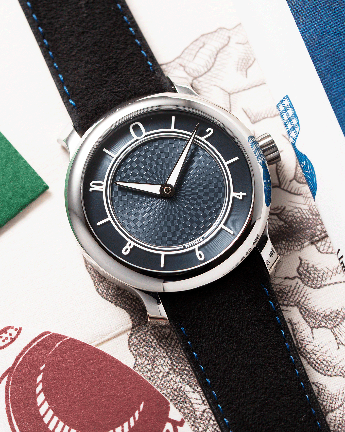 Brand: Ming Year: 2019 Model: 17.06 Material: Stainless Steel Movement: Heavily Modified ETA 2824-2 Case Diameter: 38mm Strap: Jean Rousseau Black Suede with Blue Stitching for MING