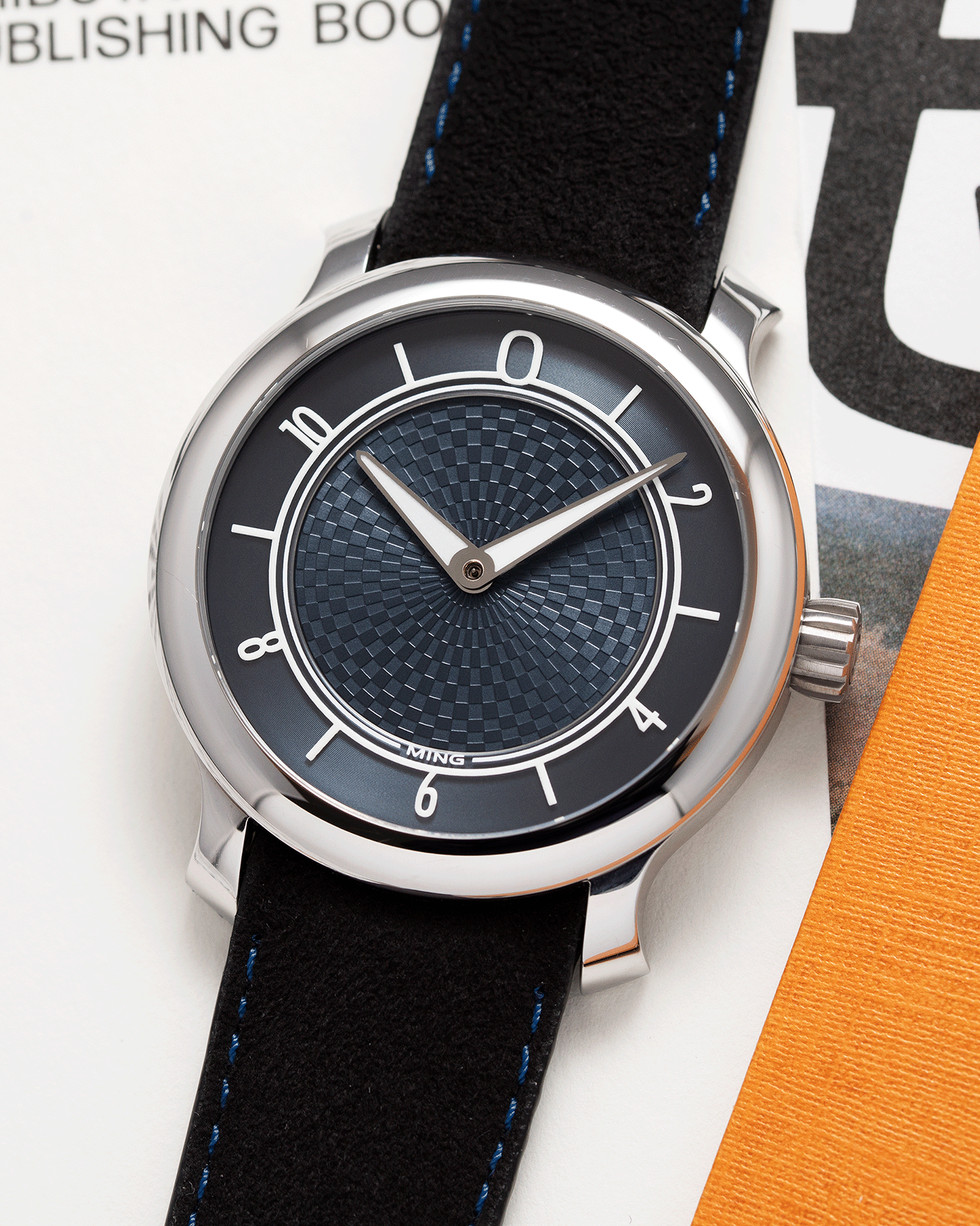 Brand: Ming Year: 2019 Model: 17.06 Material: Stainless Steel Movement: Heavily Modified ETA 2824-2 Case Diameter: 38mm Strap: Jean Rousseau Black Suede with Blue Stitching for MING