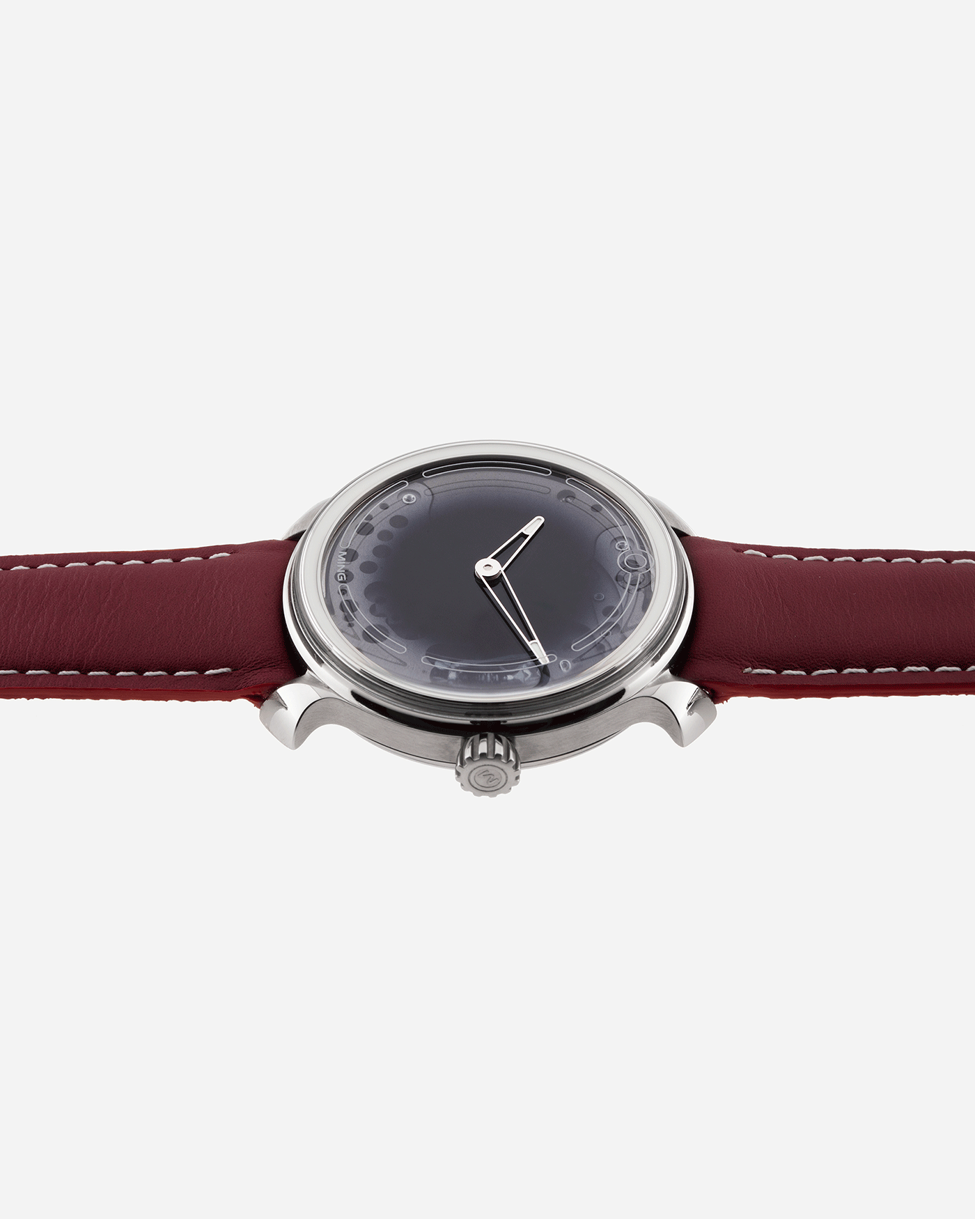 Brand: Ming Year: 2017 Model: 19.01 Material: Grade 5 Titanium Movement: Schwarz-Etienne for MING Cal. MSE100.1 Case Diameter: 39mm Strap: Ming / Jean Rousseau Red Leather Strap