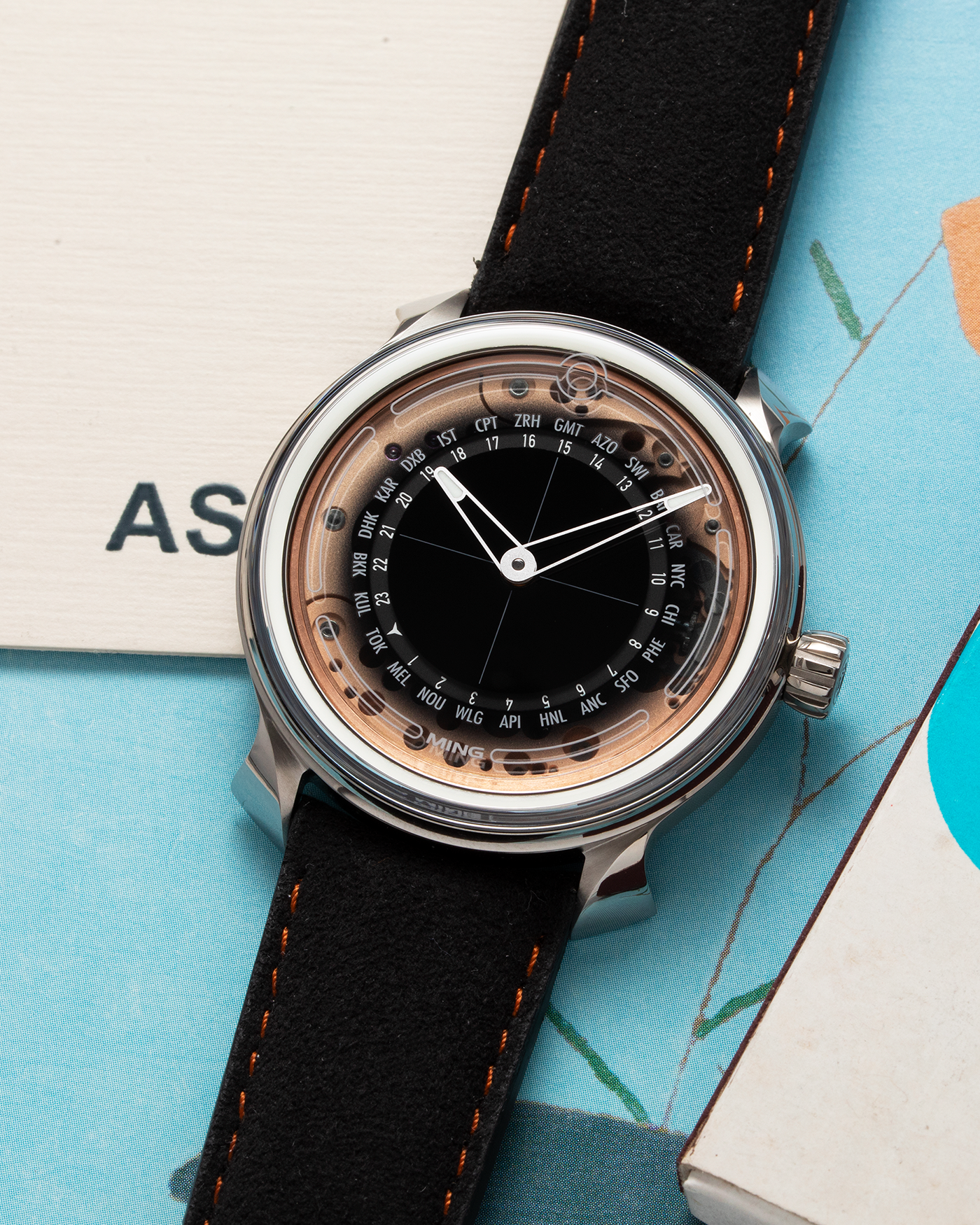 Brand: Ming Year: 2020 Model: 19.02 World Time Material: Grade 5 Titanium Movement: Schwarz-Etienne for MING Cal. ASE 220.1 Case Diameter: 39mm Strap: Jean Rousseau X Ming Black Suede and Stainless Steel Tang Buckle