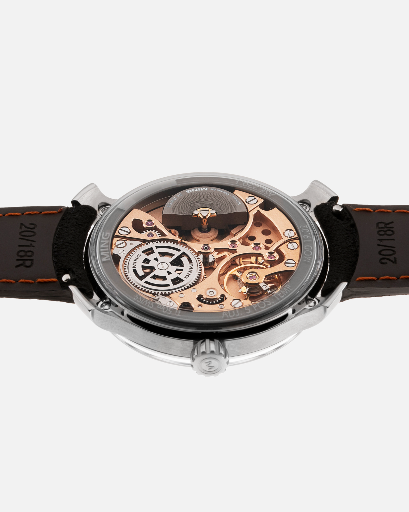 Brand: Ming Year: 2020 Model: 19.02 World Time Material: Grade 5 Titanium Movement: Schwarz-Etienne for MING Cal. ASE 220.1 Case Diameter: 39mm Strap: Jean Rousseau X Ming Black Suede and Stainless Steel Tang Buckle