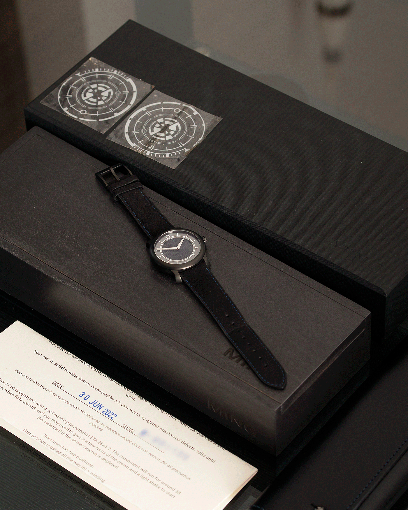 Brand: Ming Year: 2019 Model: 17.06 Special Caves Project Material: Stainless Steel Movement: Heavily Modified ETA 2824-2 Case Diameter: 38mm Strap: Jean Rousseau Black Suede with Blue Stitching for MING