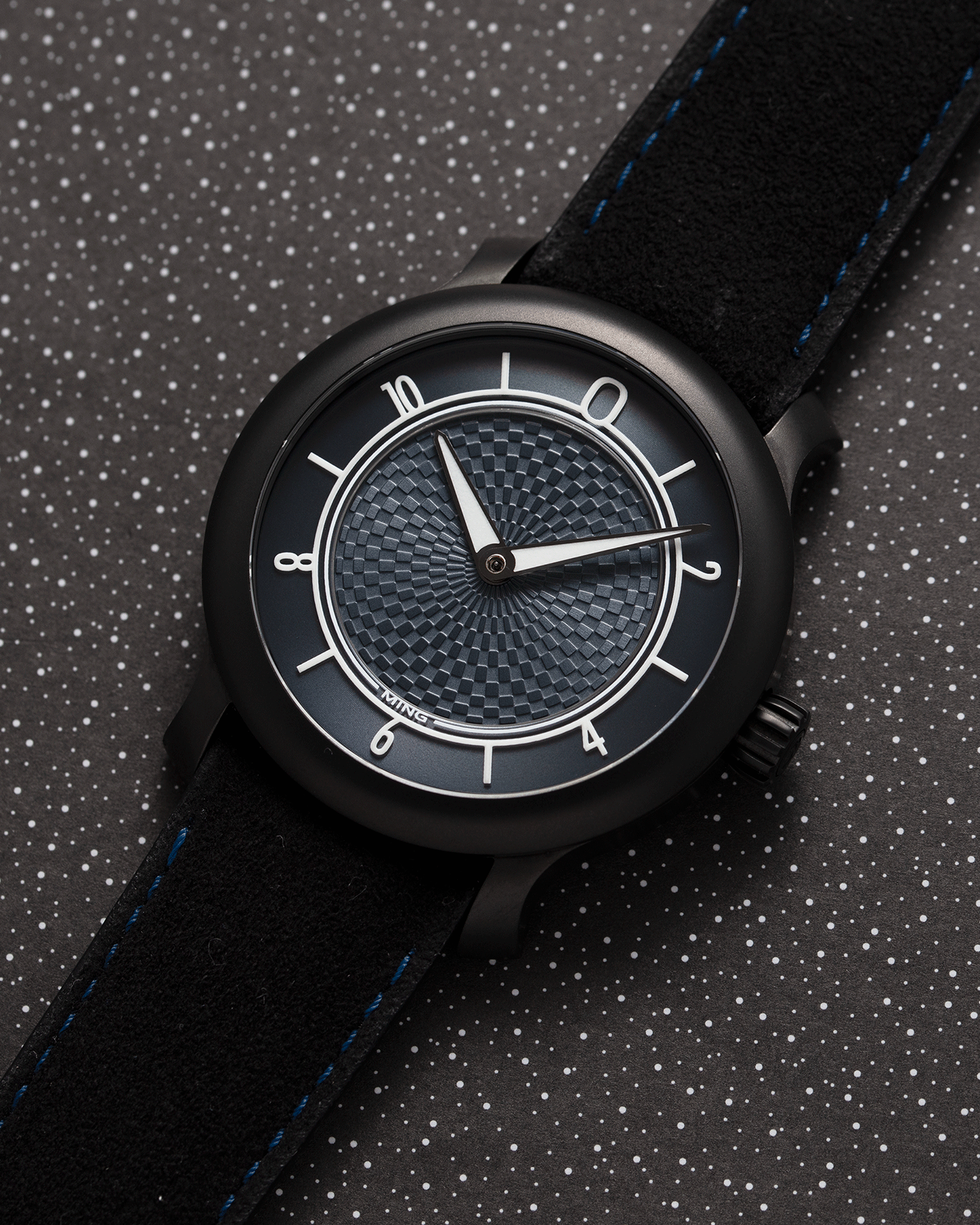Brand: Ming Year: 2019 Model: 17.06 Special Caves Project Material: Stainless Steel Movement: Heavily Modified ETA 2824-2 Case Diameter: 38mm Strap: Jean Rousseau Black Suede with Blue Stitching for MING