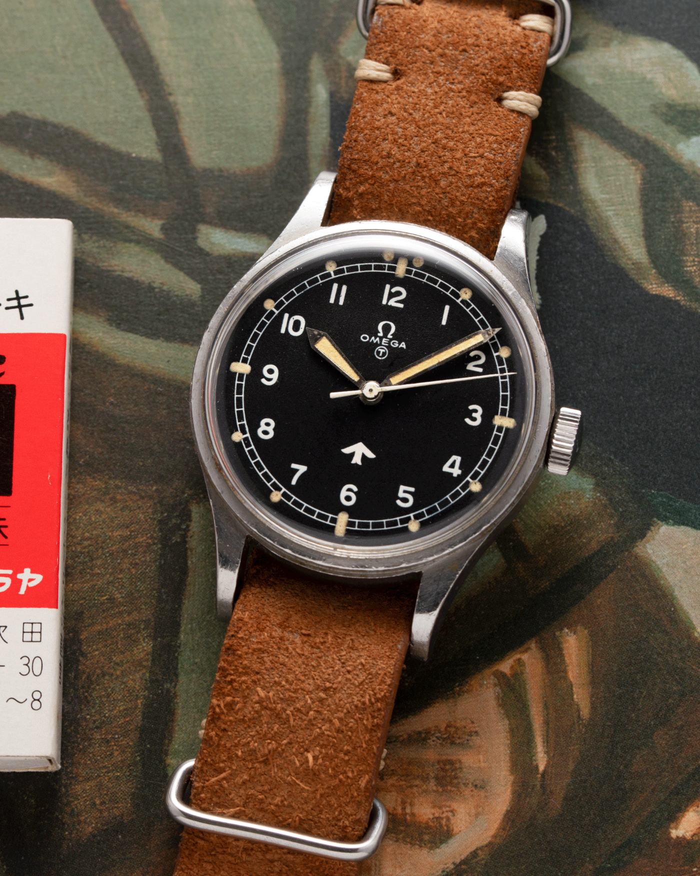 Brand: Omega Year: 1953 Model: Fat Arrow 53 Reference Number: CK 2777-1 Material: Stainless Steel Movement: ‘Specially Adjusted’ Cal. 283 Case Diameter: 37mm Lug Width: 18mm Bracelet/Strap: JPM X S.Song Sand Brown Distressed Leather NATO