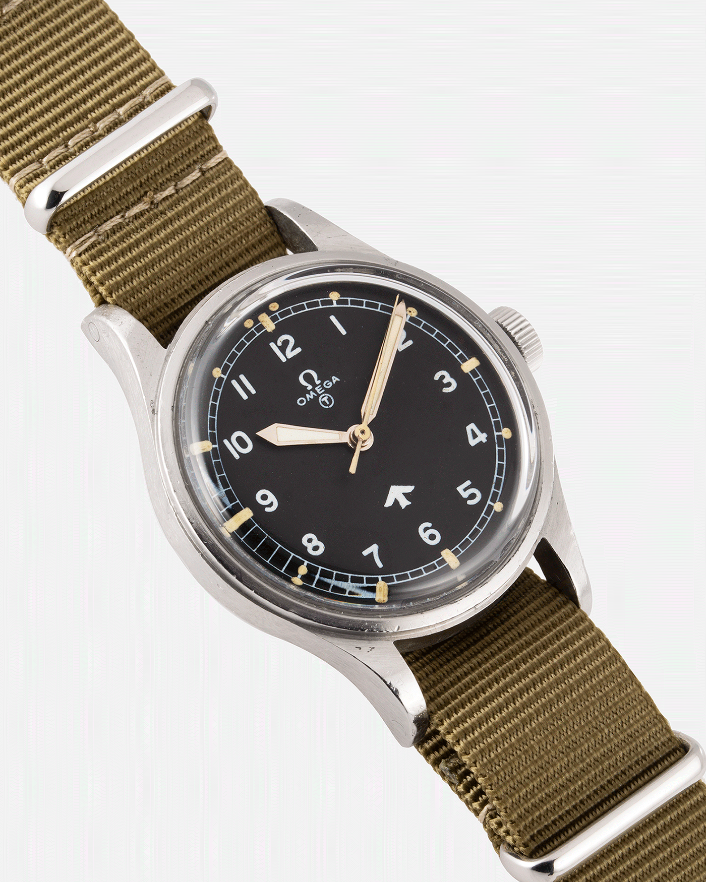 Brand: Omega Year: 1953 Model: Fat Arrow 53 Reference Number: CK 2777-1 Material: Stainless Steel Movement: ‘Specially Adjusted’ Cal. 283 Case Diameter: 37mm Lug Width: 18mm Bracelet/Strap: Green Fabric NATO