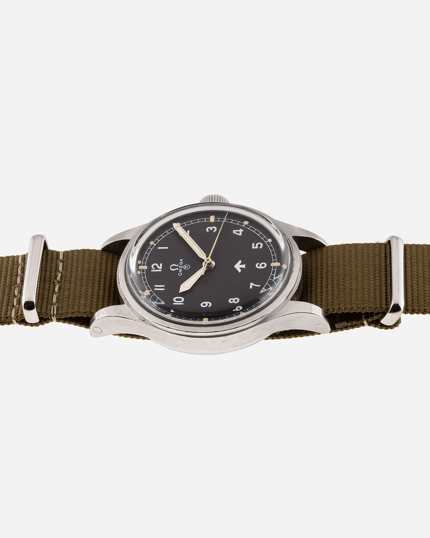 Brand: Omega Year: 1953 Model: Fat Arrow 53 Reference Number: CK 2777-1 Material: Stainless Steel Movement: ‘Specially Adjusted’ Cal. 283 Case Diameter: 37mm Lug Width: 18mm Bracelet/Strap: Green Fabric NATO
