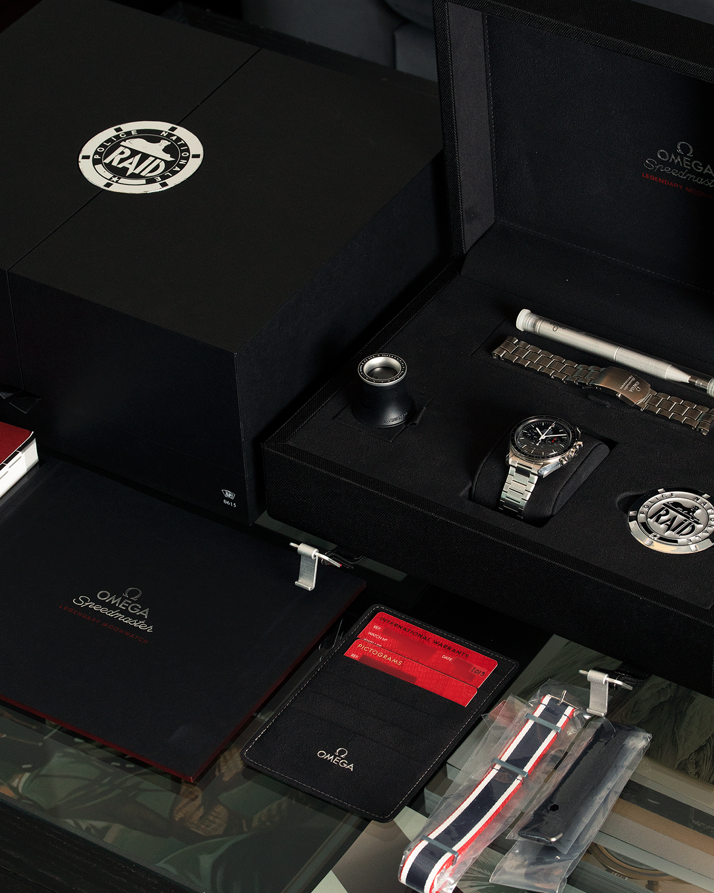 Brand: Omega Year: 2017 Model: Speedmaster RAID Material: Stainless Steel Movement: Omega in-house Cal. 1861 Case Diameter: 40mm Bracelet/Strap: Forstner Flat Link Bracelet, Omega Speedmaster Bracelet, RAID NATO