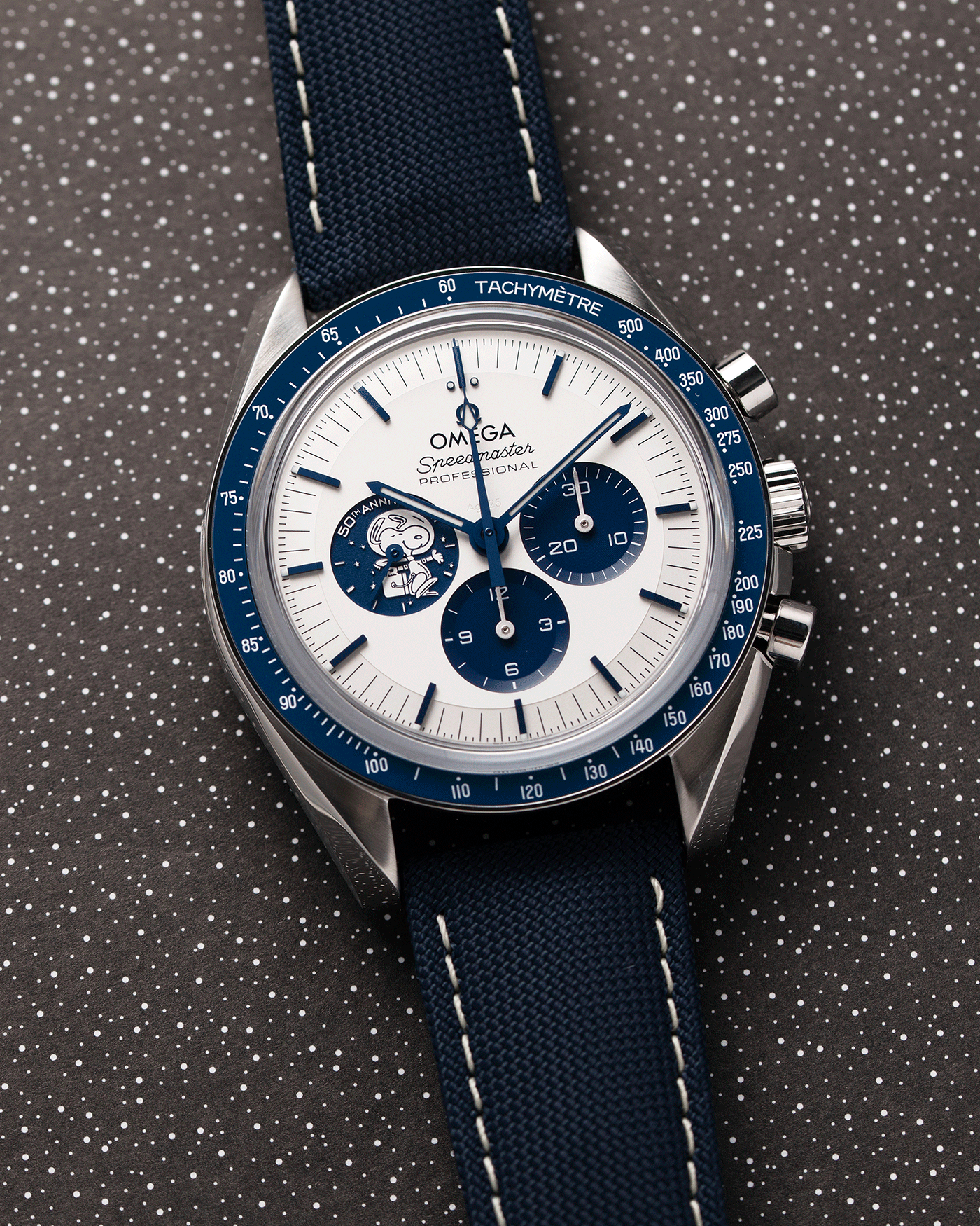 Brand: Omega Year: 2021 Model: Speedmaster Silver Snoopy Award 50th Anniversary Reference Number: 310.32.42.50.02.001 Material: Stainless Steel Movement: Omega in-house Cal. 3861 Case Diameter: 42mm Bracelet/Strap: Omega Blue Coated Nylon Fabric Strap with Omega Stainless Steel Tang Buckle