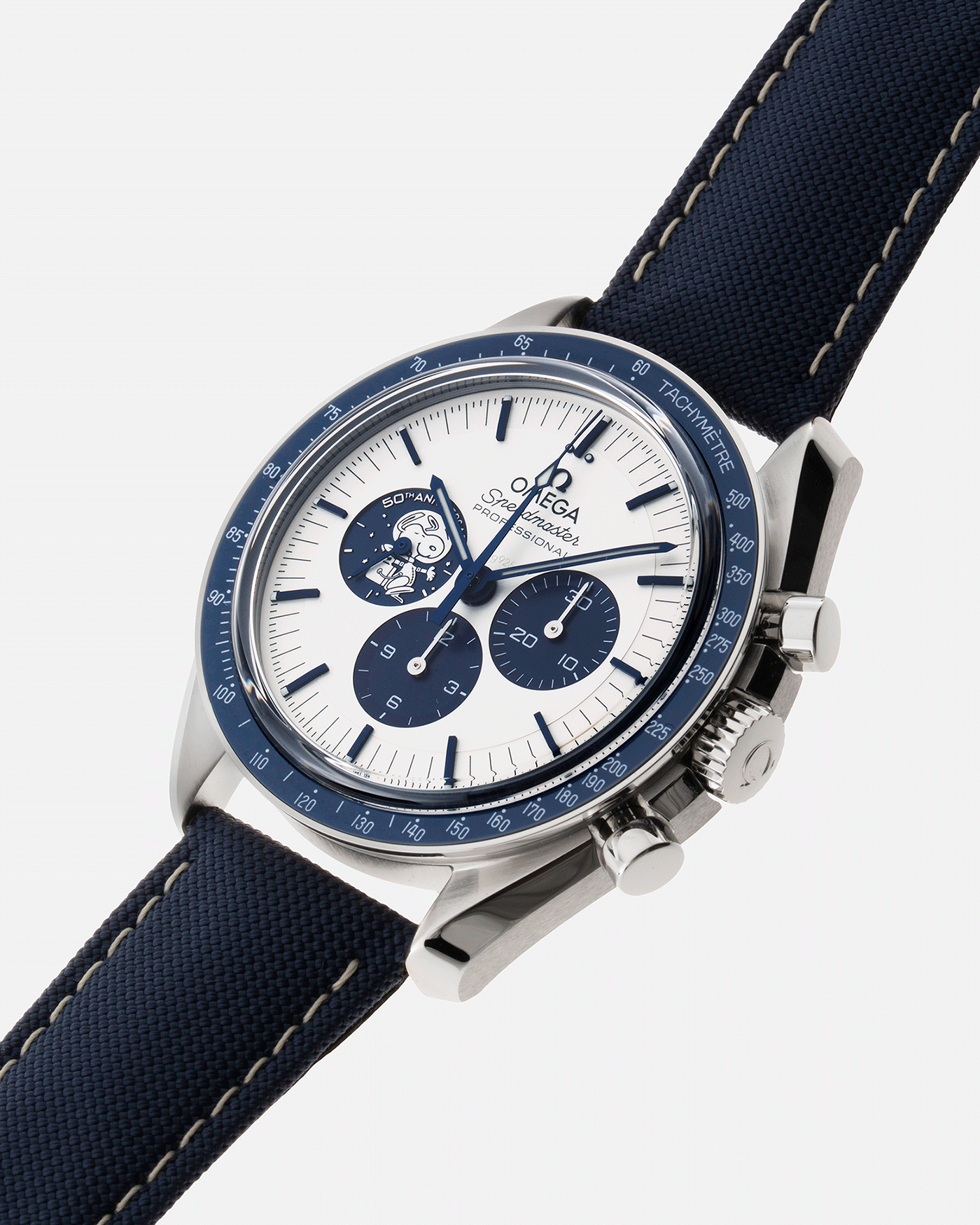 Brand: Omega Year: 2021 Model: Speedmaster Silver Snoopy Award 50th Anniversary Reference Number: 310.32.42.50.02.001 Material: Stainless Steel Movement: Omega in-house Cal. 3861 Case Diameter: 42mm Bracelet/Strap: Omega Blue Coated Nylon Fabric Strap with Omega Stainless Steel Tang Buckle