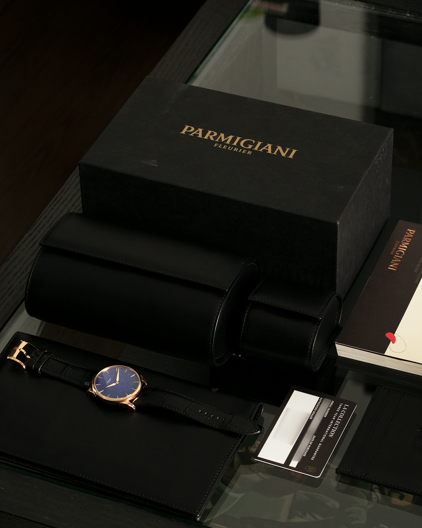 Brand: Parmigiani Fleurier Year: 2022 Model: Tonda 1950 Pisa Edition Lapis Lazuli Material: 18k Rose Gold Movement: In-House PF 701 Micro Rotor Case Diameter: 39mm Strap: Parmigiani Black Alligator with 18k Rose Gold Tang Buckle
