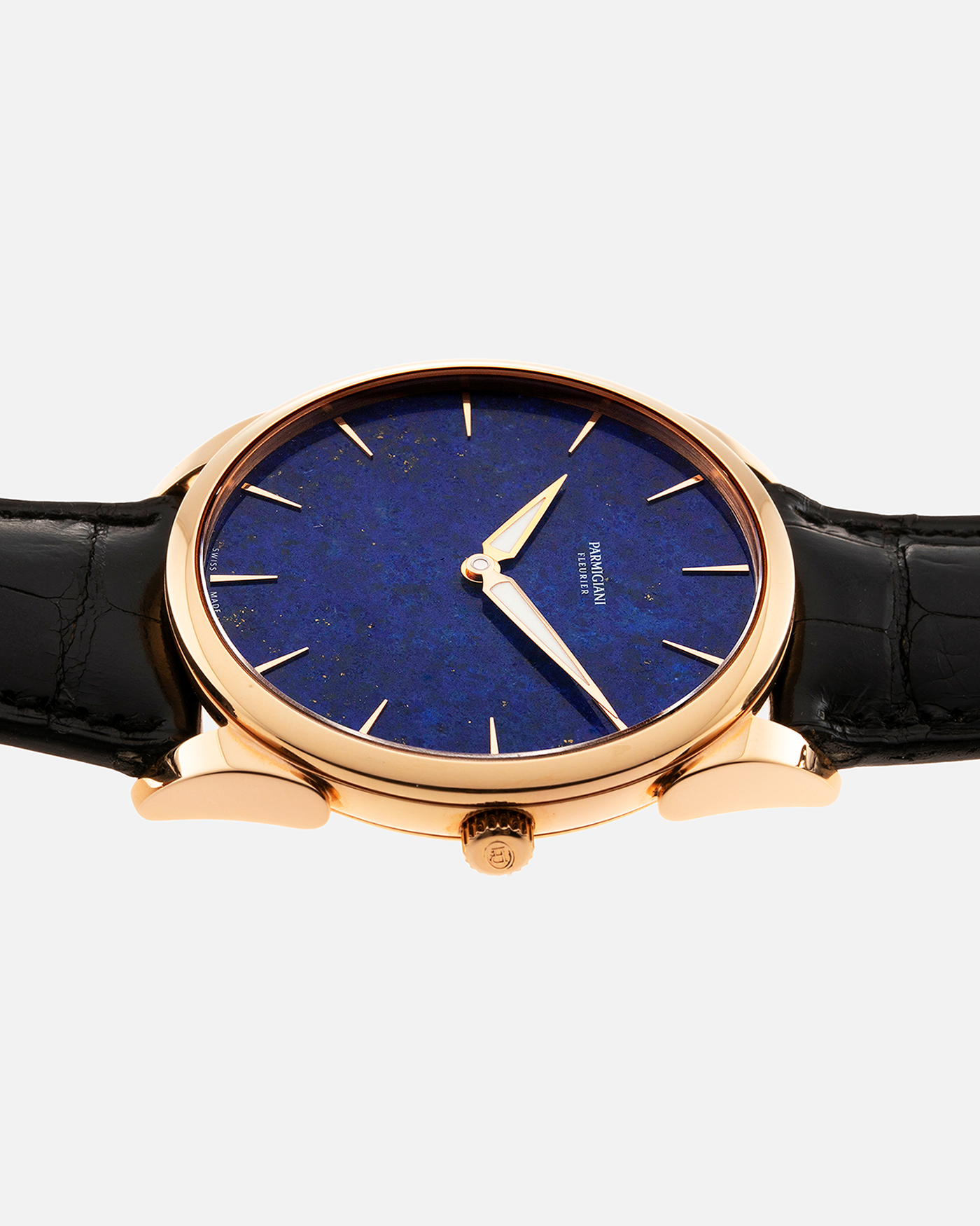 Brand: Parmigiani Fleurier Year: 2022 Model: Tonda 1950 Pisa Edition Lapis Lazuli Material: 18k Rose Gold Movement: In-House PF 701 Micro Rotor Case Diameter: 39mm Strap: Parmigiani Black Alligator with 18k Rose Gold Tang Buckle