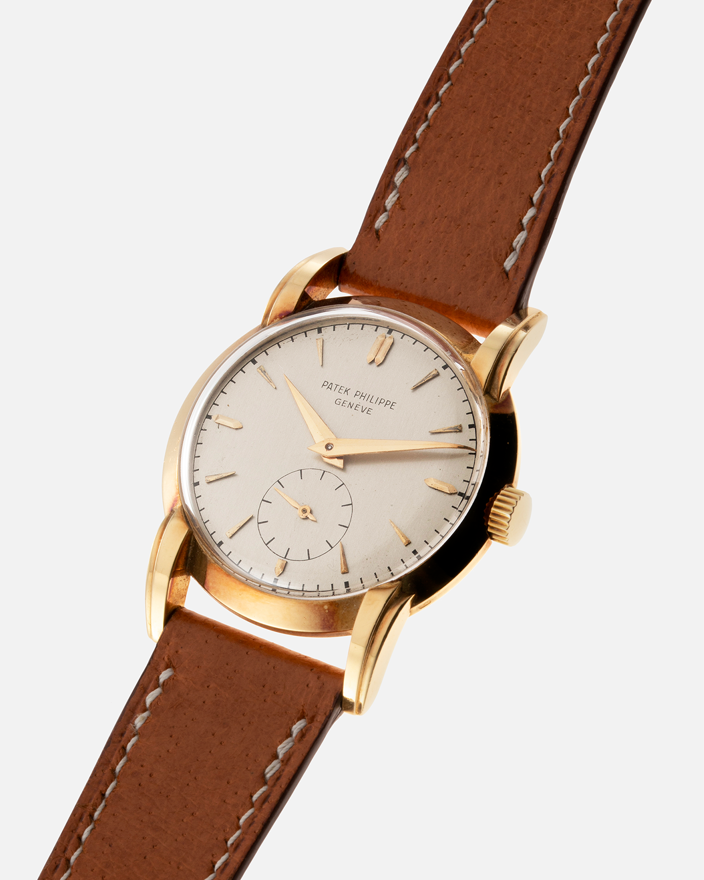 Brand: Patek Philippe Year: 1940 - 1950s Reference Number: 2429 Material: 18-carat Yellow Gold Movement: Cal. 10-200, Manual-Winding Case Diameter: 33mm Bracelet/Strap: Light Brown Nostime Calf Strap with 18k Patek Philippe 18-carat Yellow Gold Tang Buckle